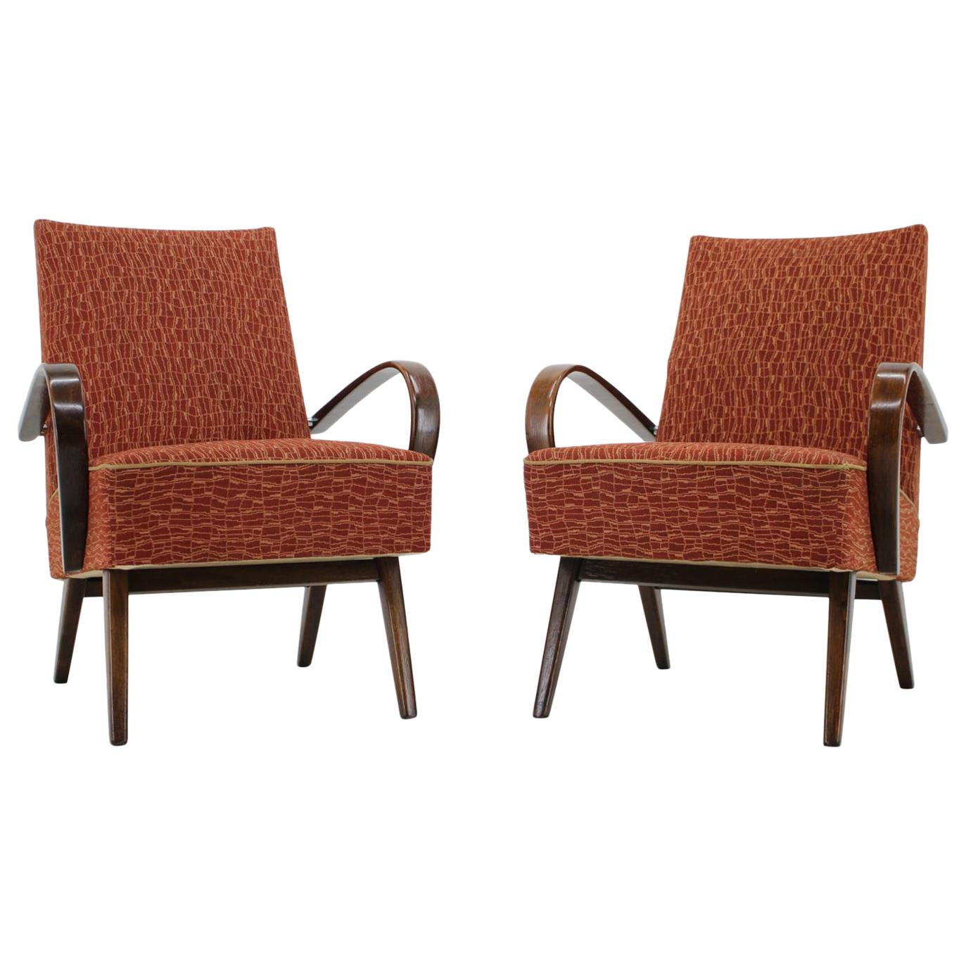 1950s Set of Two Armchairs and a Coffee Table by Abraham and Roll For