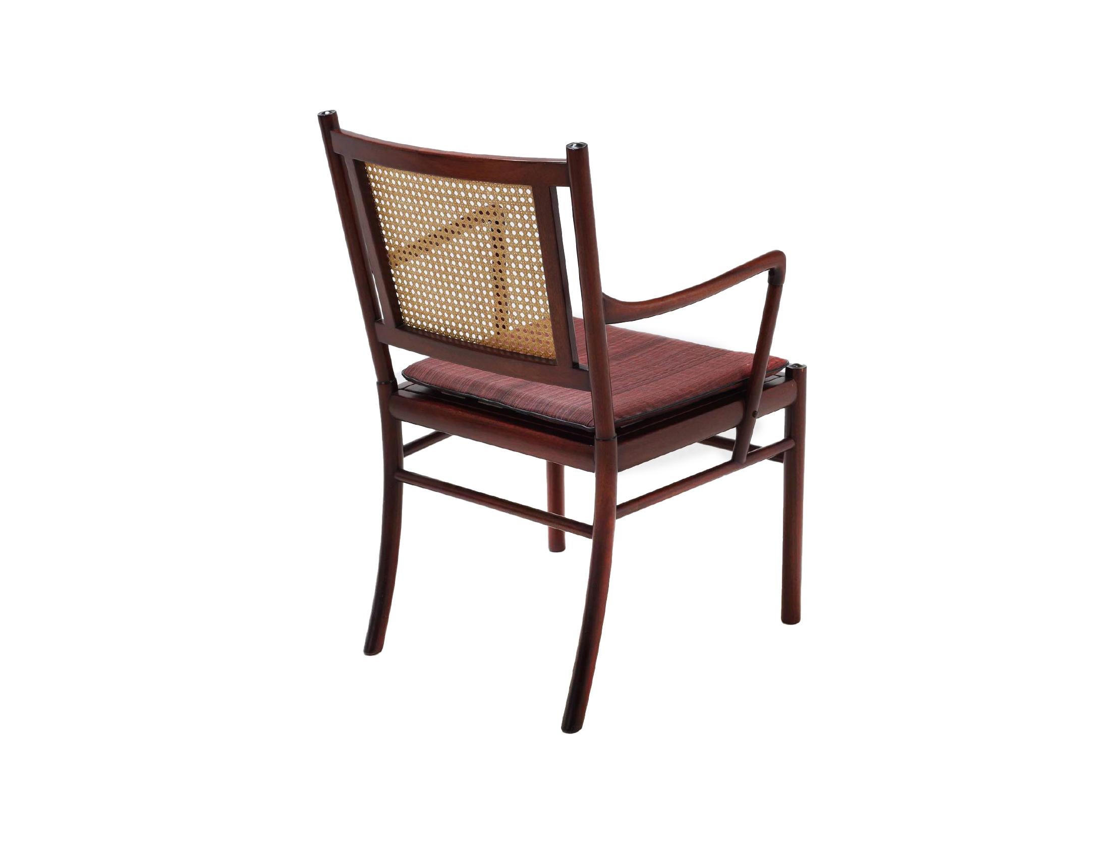 Scandinavian Modern Set of two armchairs from Ole Wanscher in mahogany, cane and fabric Denmark 1960