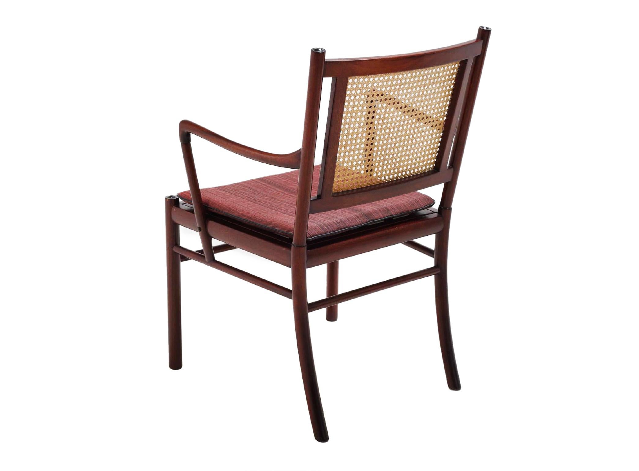 Danish Set of two armchairs from Ole Wanscher in mahogany, cane and fabric Denmark 1960