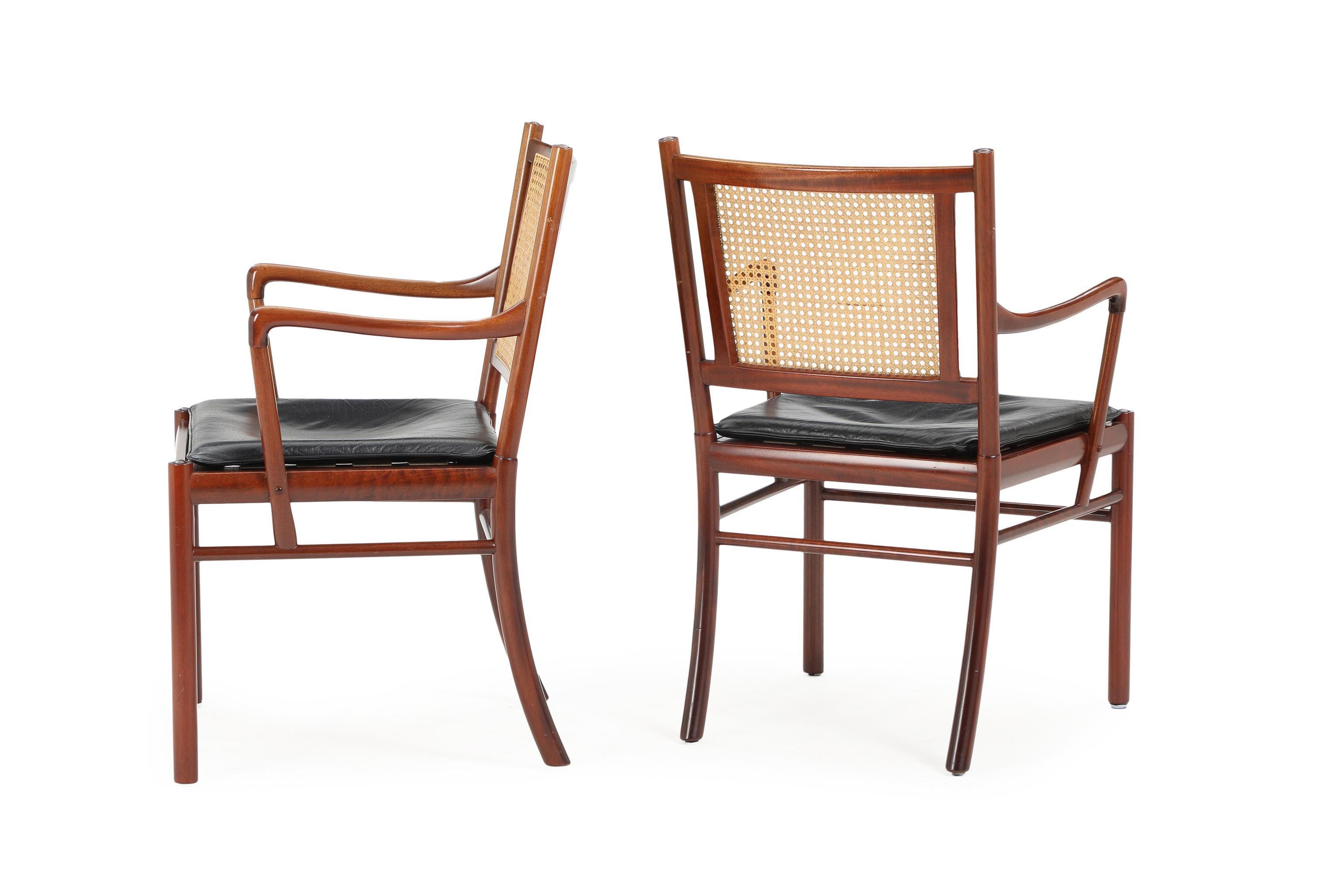 Mid-20th Century Set of two armchairs from Ole Wanscher in mahogany, cane and leather Denmark 60s For Sale