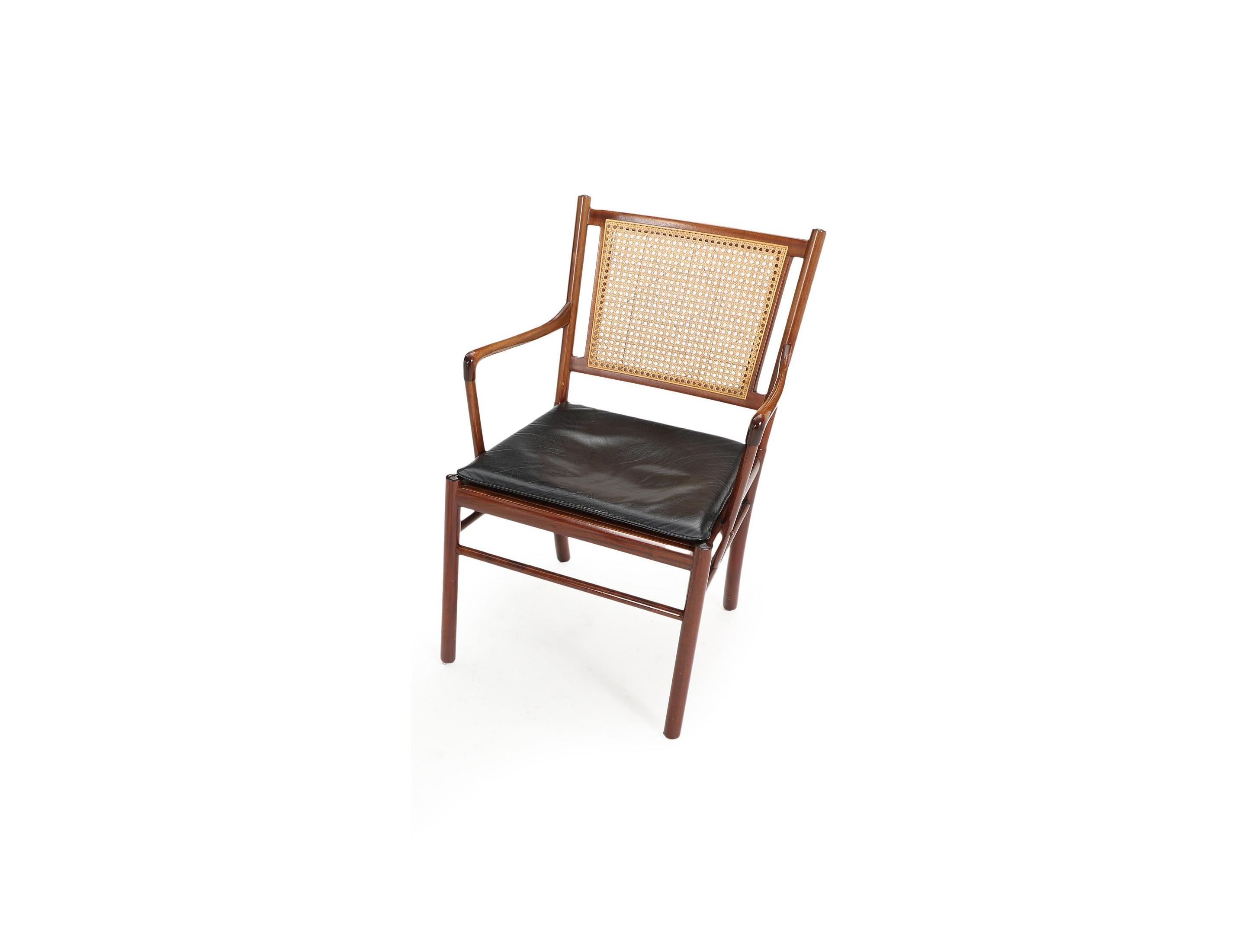 Canne Ensemble de deux fauteuils d'Ole Wanscher en acajou, rotin et cuir Danemark années 60 en vente