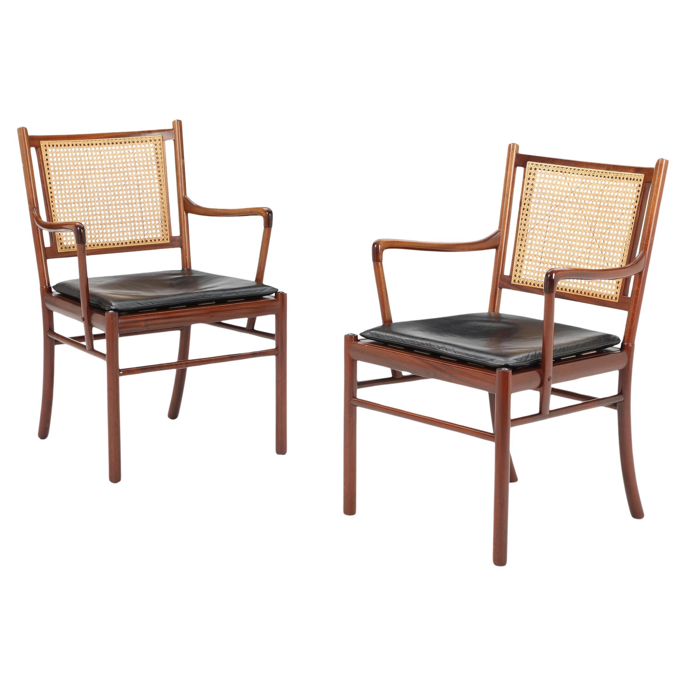 Set of two armchairs from Ole Wanscher in mahogany, cane and leather Denmark 60s For Sale