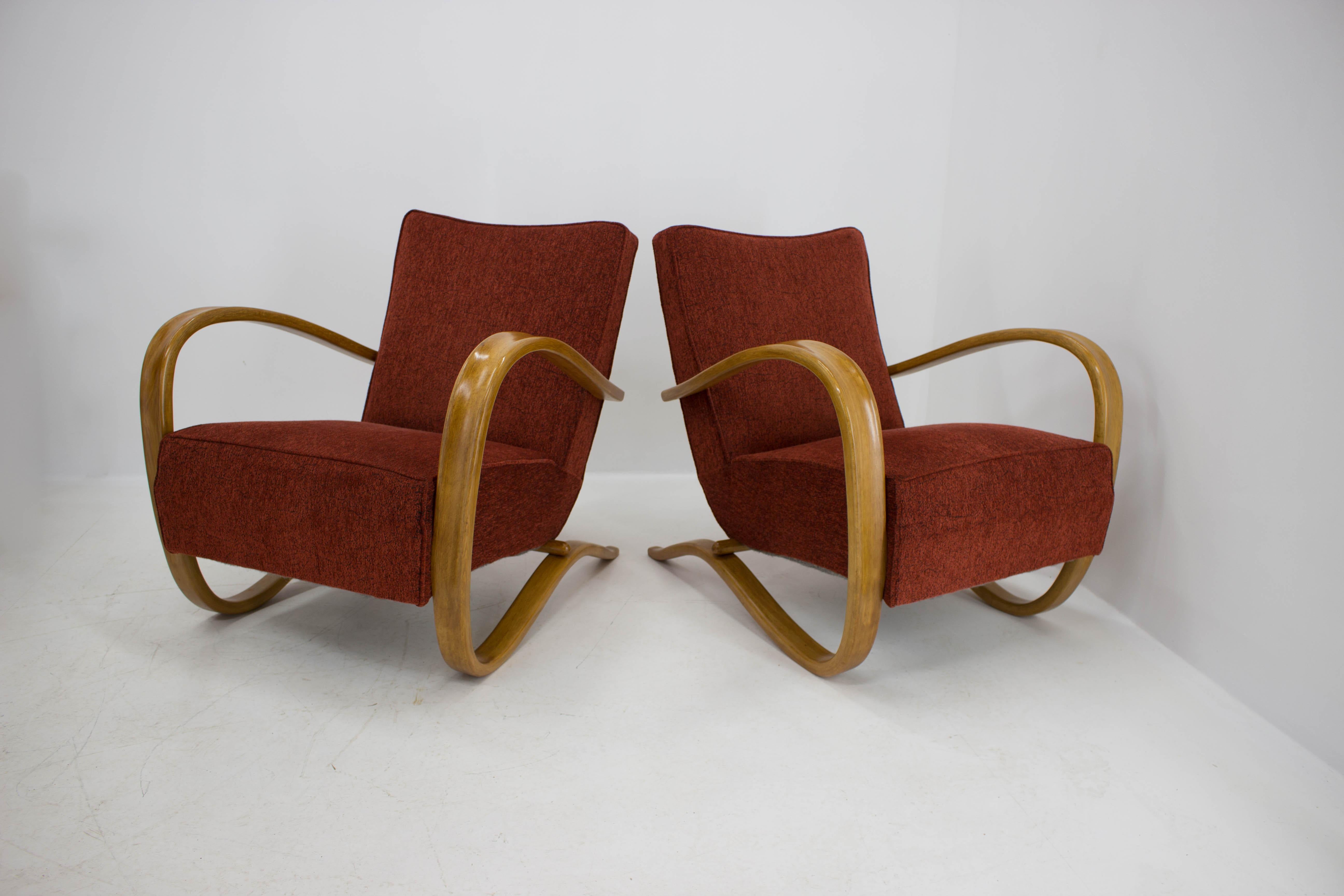 Pair of Art Deco armchairs H269 by Jindrich Halabala. Two years after new upholstery and new shelac they have some signs of use. Very sturdy stabil and comfortable.