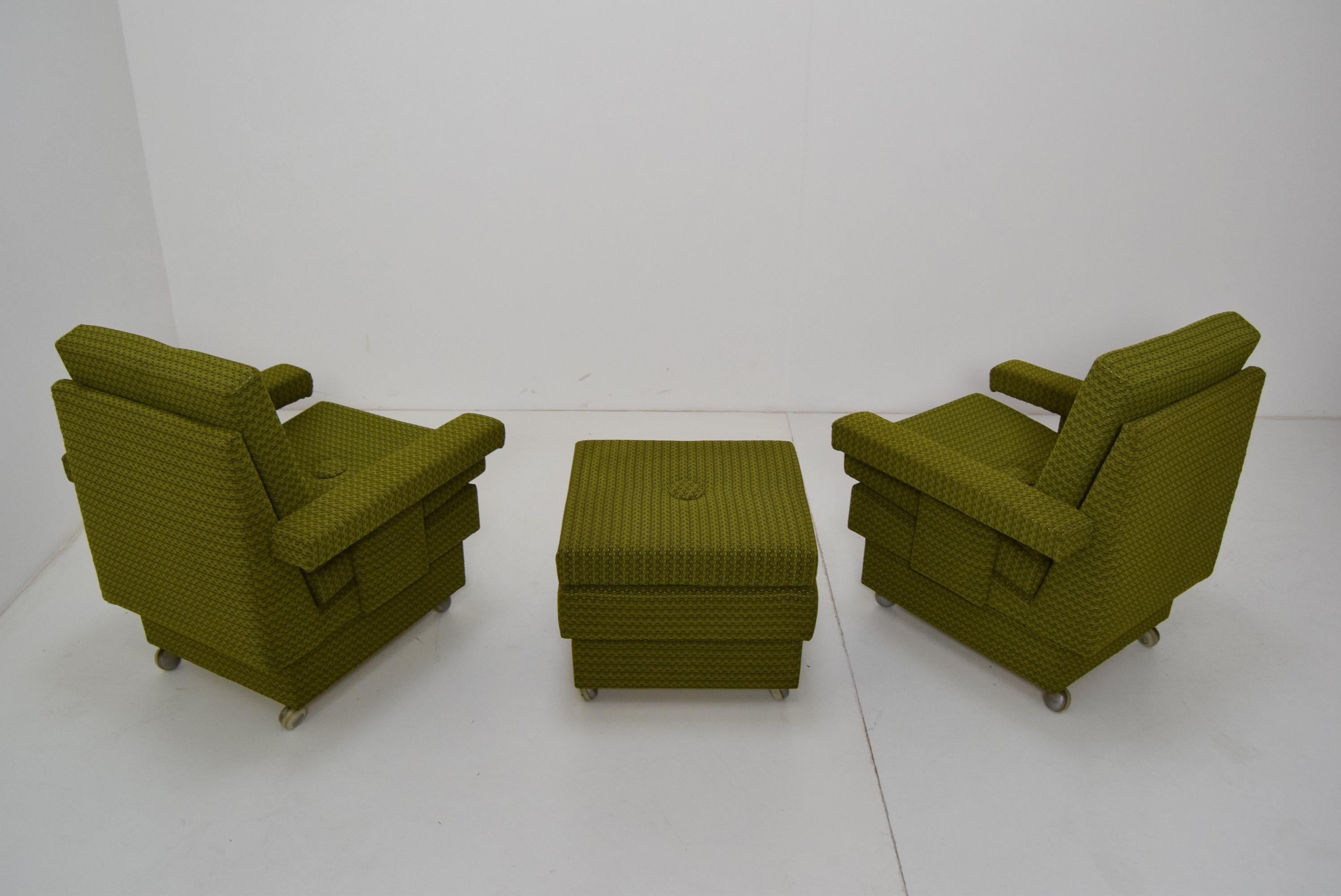 Mid-Century Modern Set of Two Armchairs in the Middle of the Century with Footstool and with Wheels For Sale