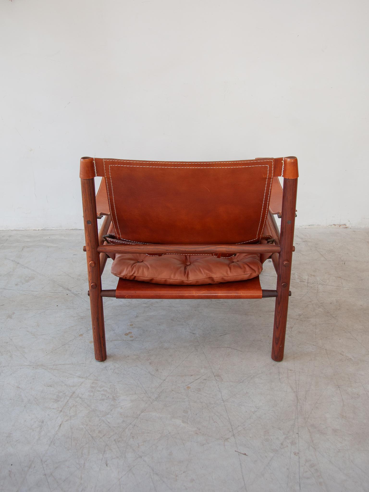 Cuir Ensemble de deux fauteuils lounge en cuir Arne Norell Sirocco en vente
