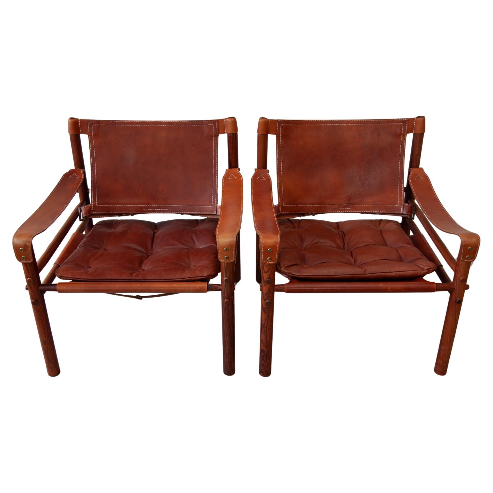Ensemble de deux fauteuils lounge en cuir Arne Norell Sirocco en vente