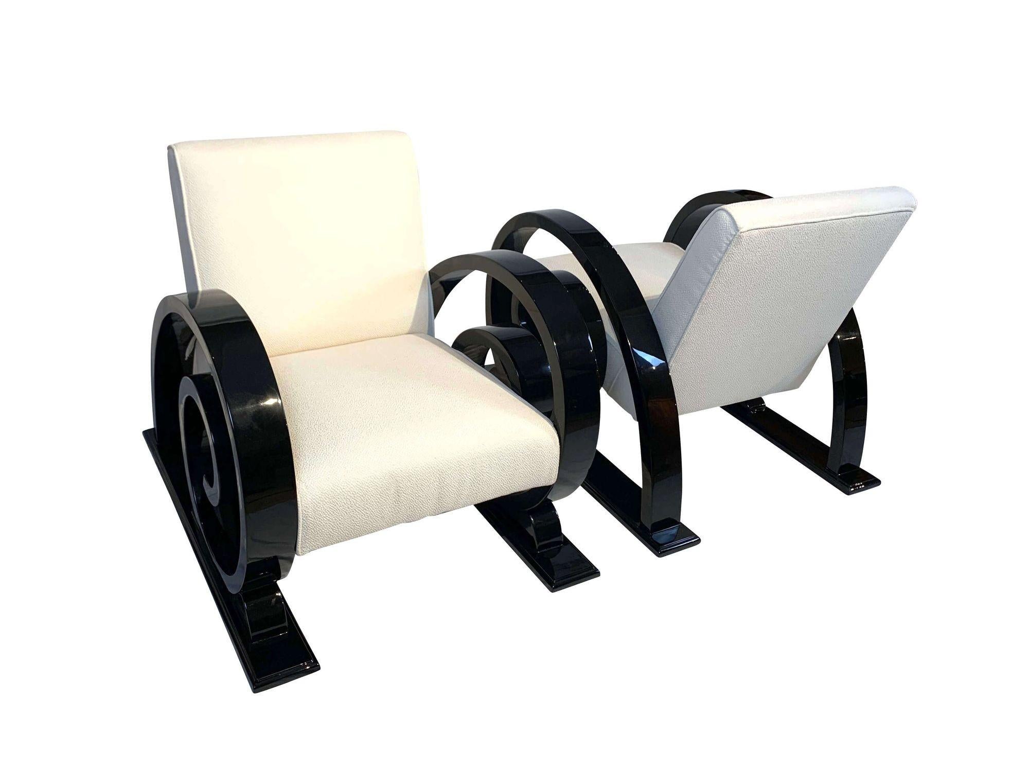 Set of two Art Deco club chairs, black lacquer, creme fabric, France circa 1930

Beautiful Pair of extraordinary and very rare, original Art Deco Club Chairs with volute / spirals / helical sides or armrests on runners.
Provenience: France around
