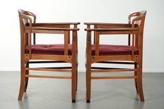 Set of two Art Nouveau design dining chairs with red fabric upholstery