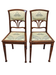 Conjunto de dos sillas Art Nouveau de roble