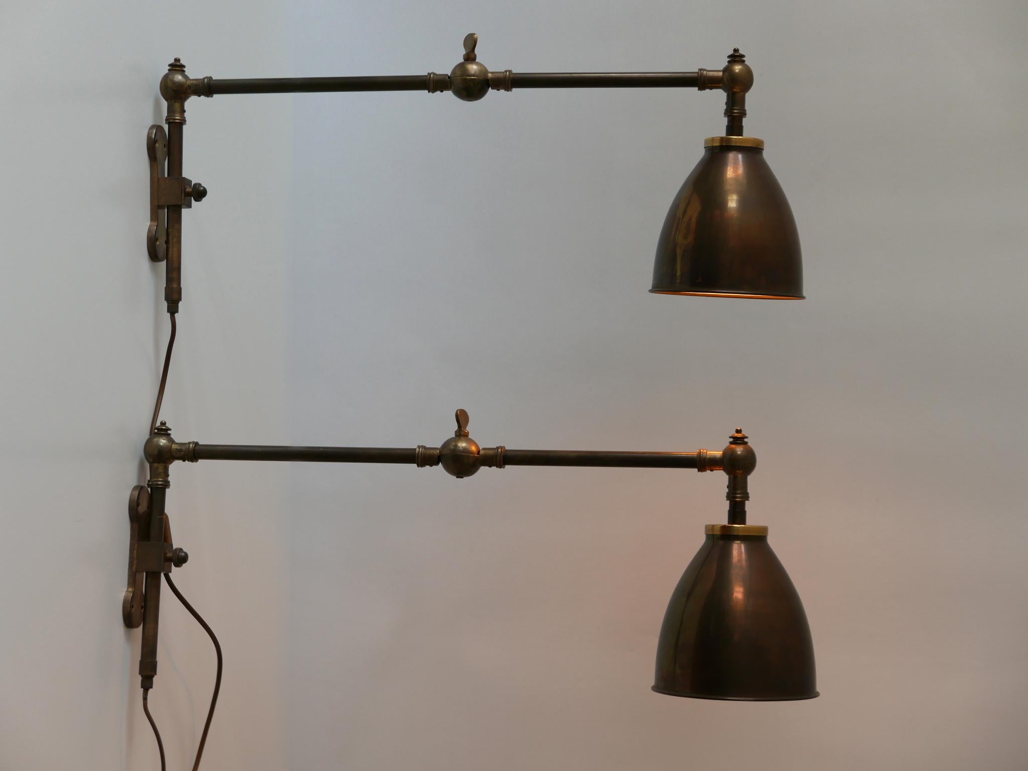 Mid-Century Modern Set of Two Articulated Brass Wall Lamps or Reading Lights 1970s Germany