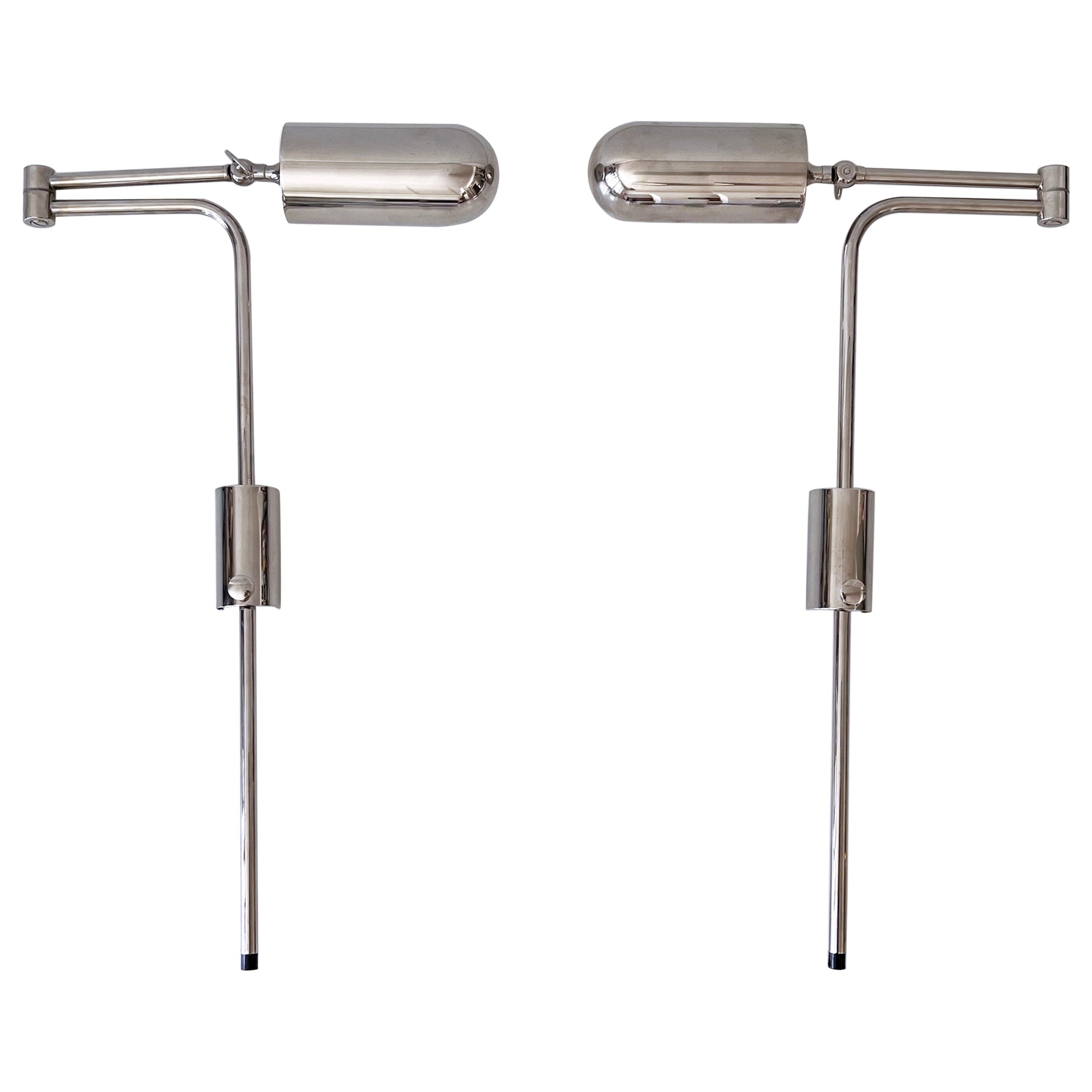Ensemble de deux appliques ou liseuses articulées par Florian Schulz 1970 en vente