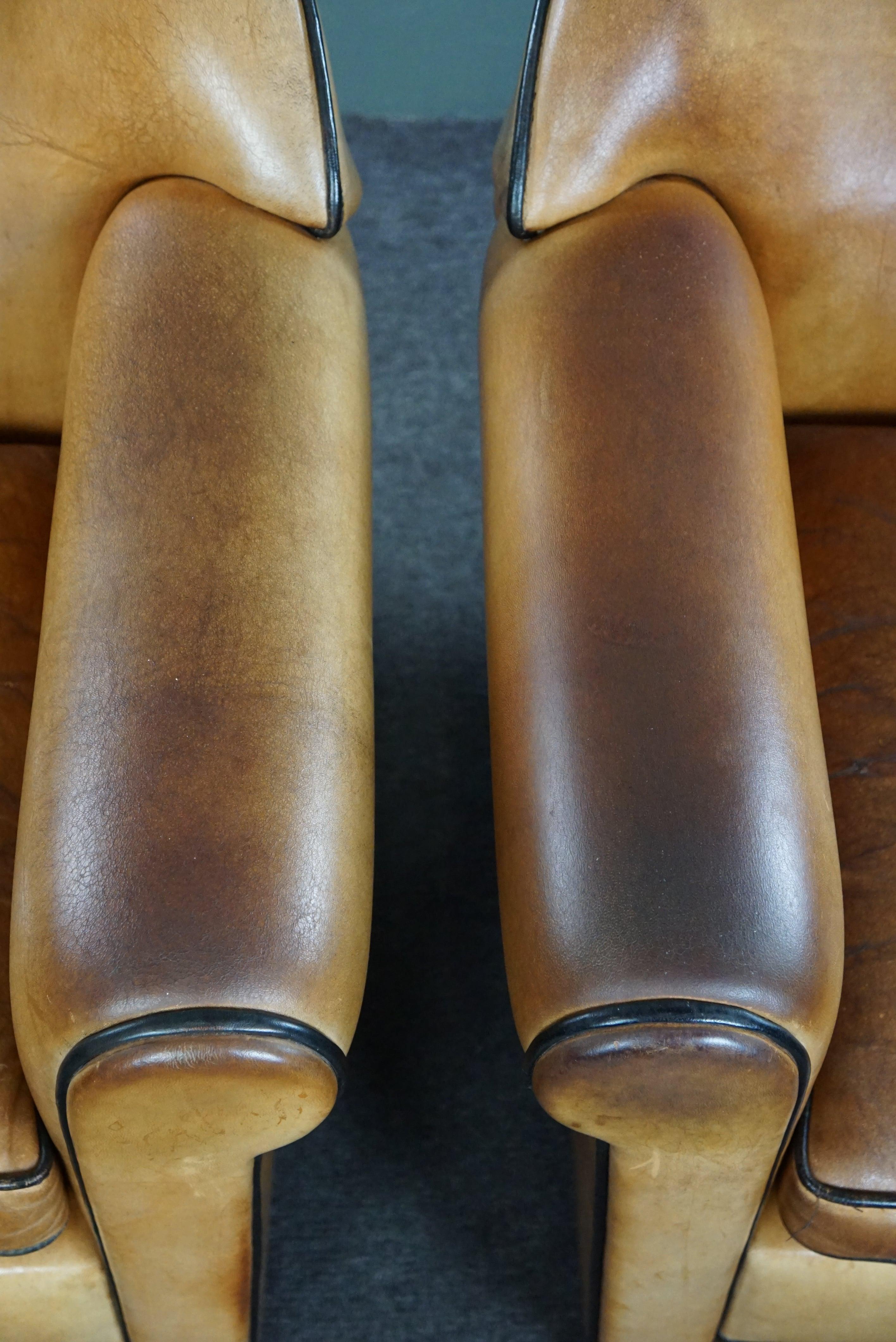 Leather Set of two beautiful Bart van Bekhoven sheep leather design armchairs For Sale