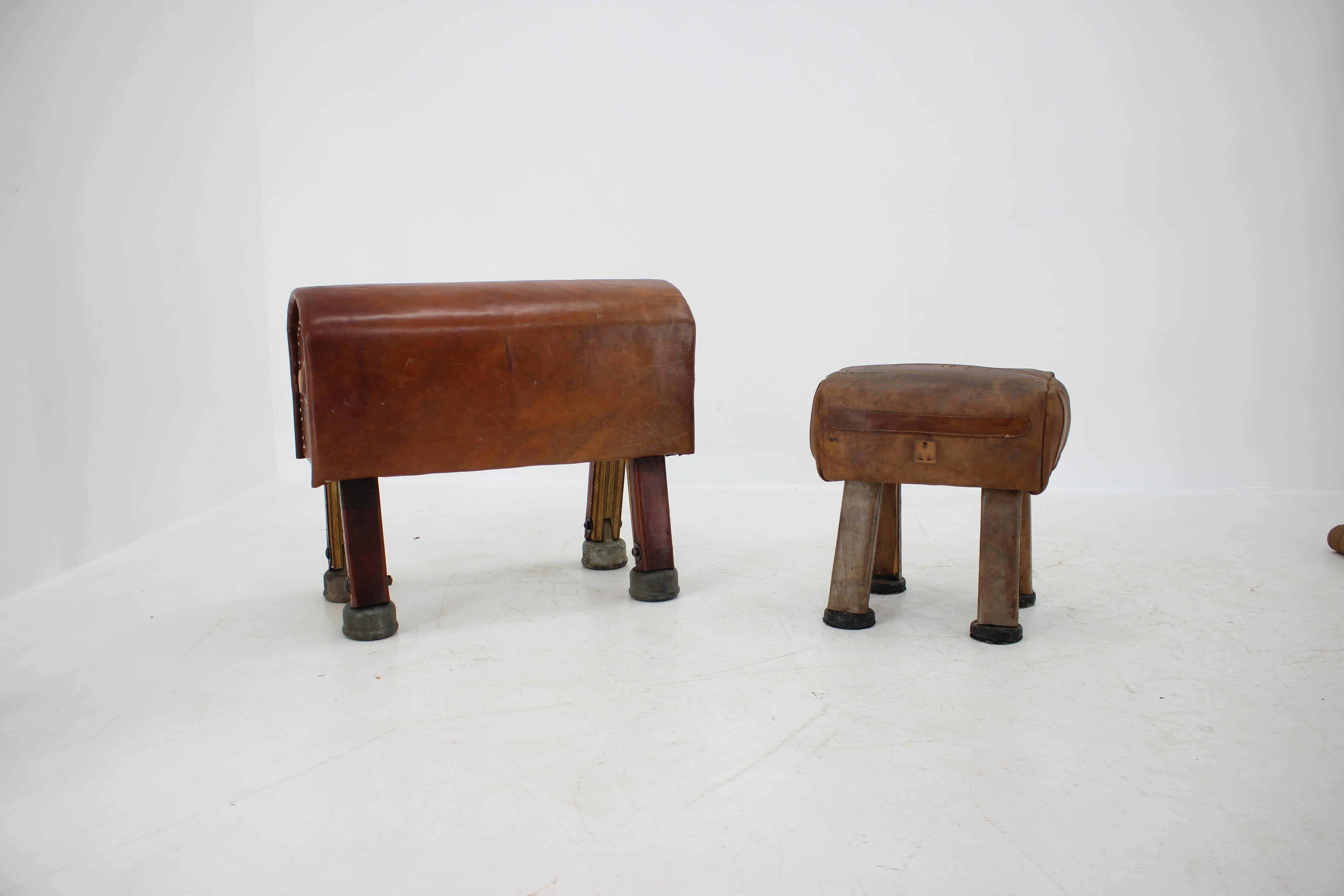Set of two benches in a sport style from wood, steel and leather.
Sizes:
Big bench - Height 62 cm
Width 73 cm
Depth 30 cm
Small bench - Height 45 cm
Width 46 cm
Depth 32 cm.