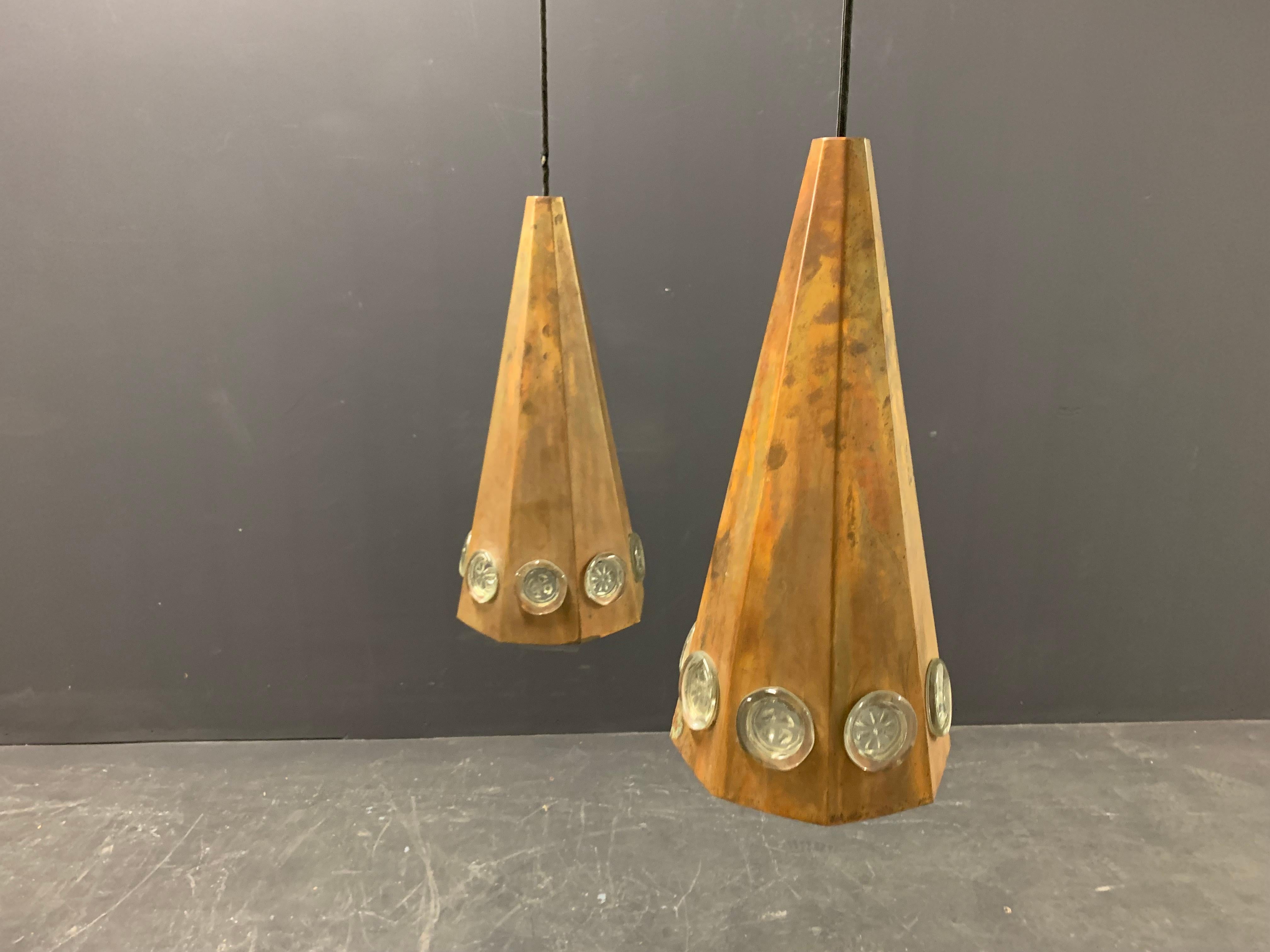 Designed by Hans Bergström and Erik Höglund for Ateljè Lyktan.

Handcrafted lamps from copper with massive glass pieces. Size is for the shades only.
