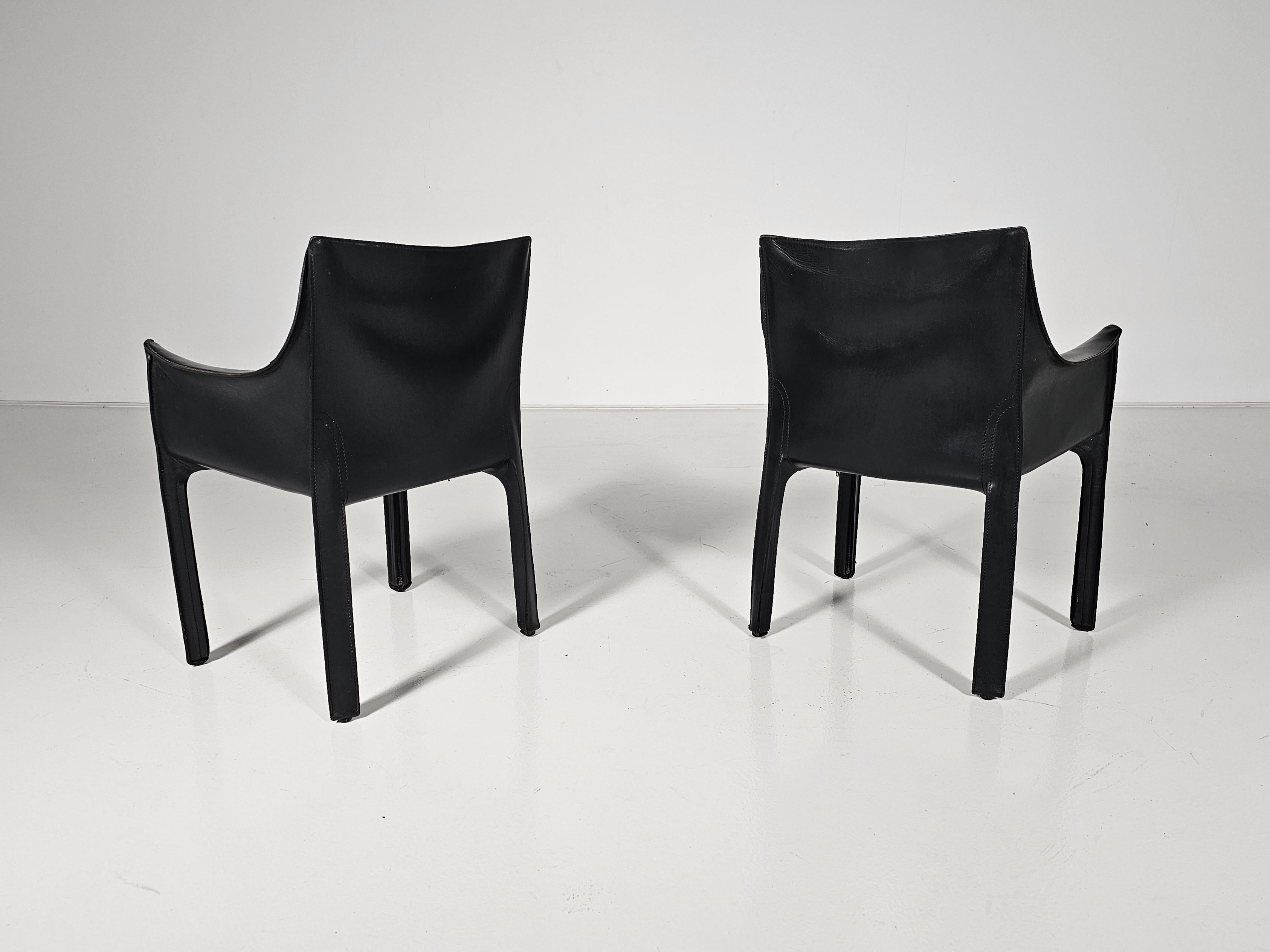 Late 20th Century Set of two black leather Cab 413 Chairs by Mario Bellini for Cassina For Sale