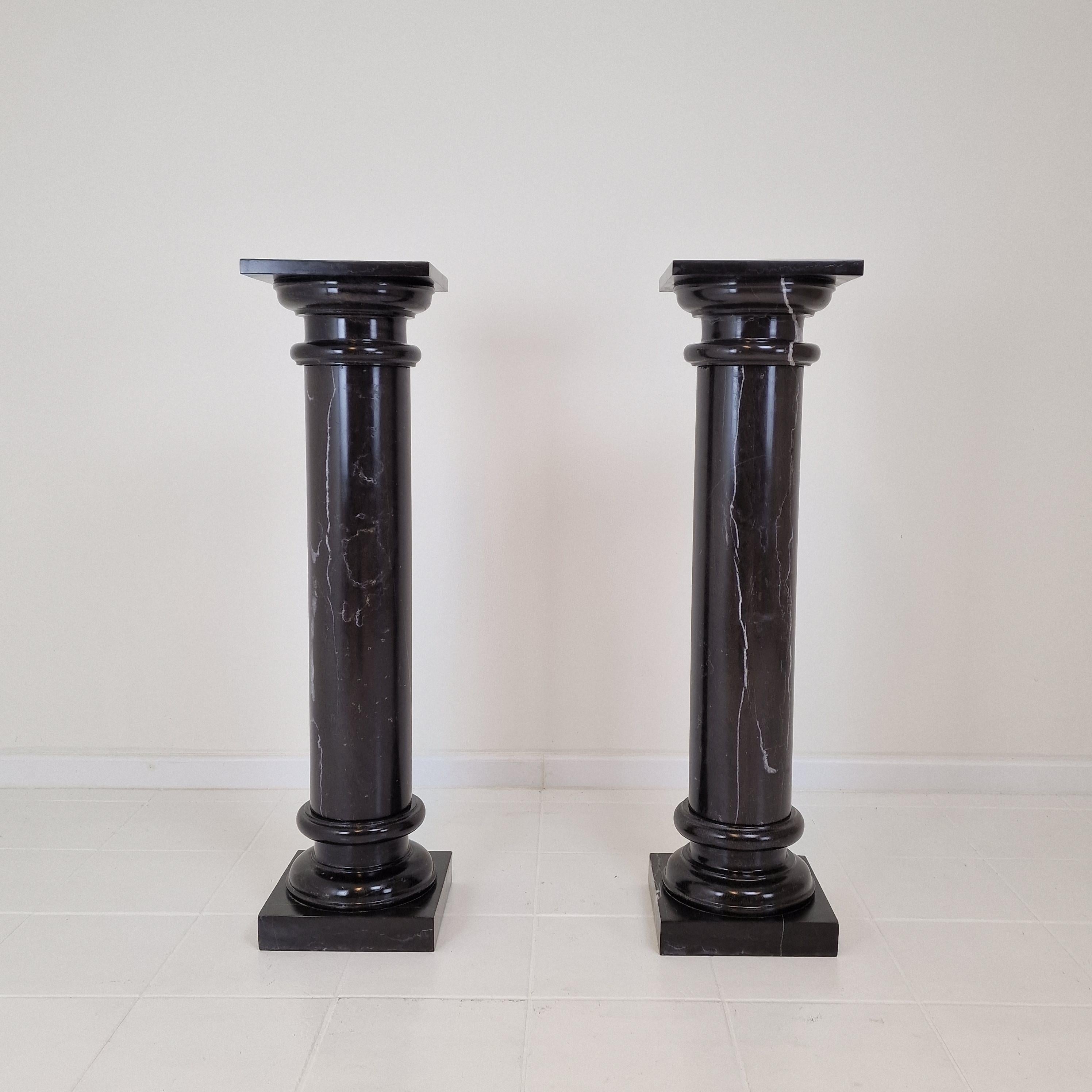 Beautiful set of 2 very large pedestals in black Belgium marble.

They can be used inside or outside the house.

They are made of beautiful and massive marble.
Please take notice of the very nice patterns.

Please take notice of the normal traces of