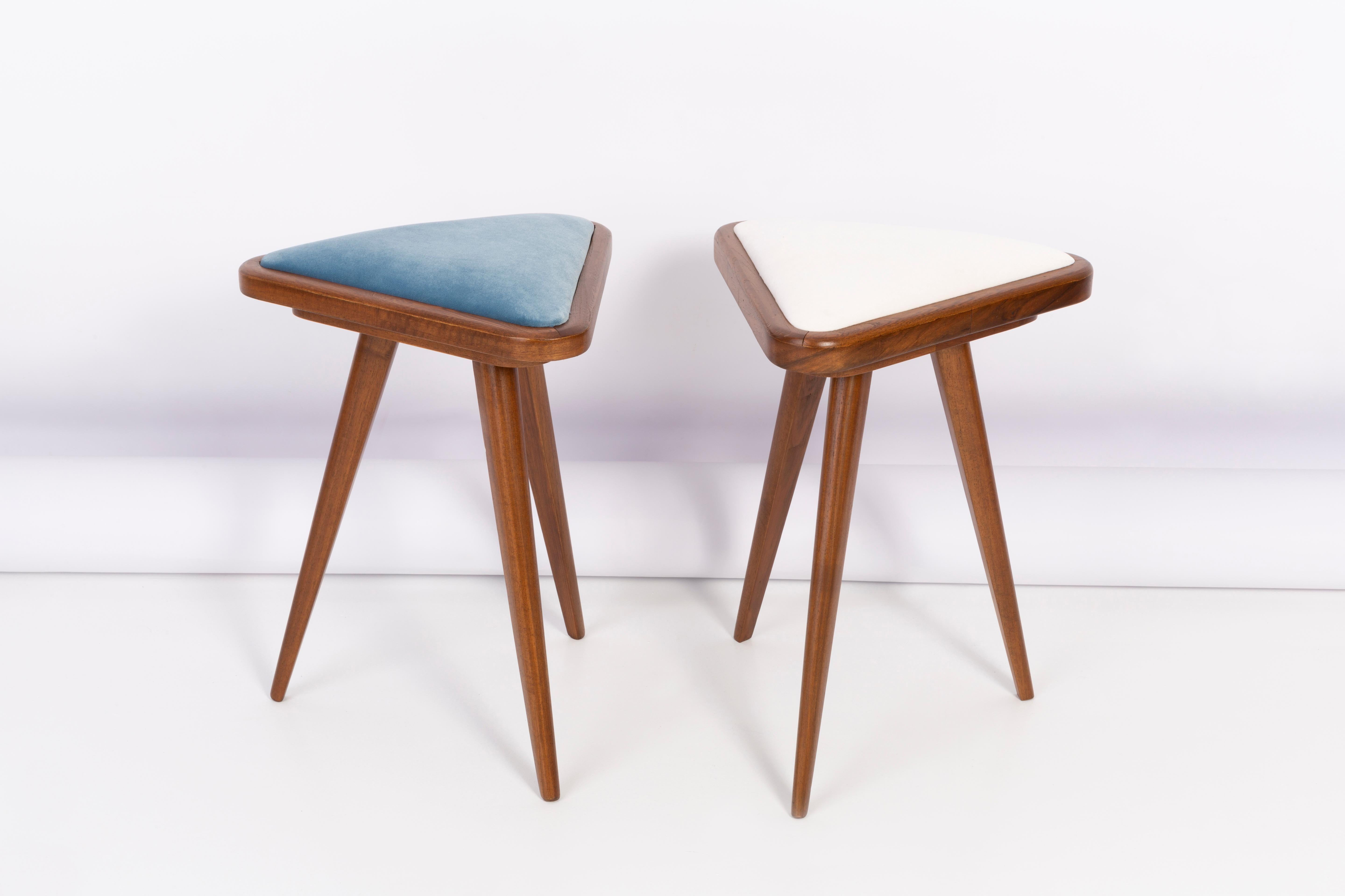 Stools from the turn of the 1960s and 1970s. Beautiful velour upholstery in 2 different colors. The stools consists of an upholstered part, a seat and wooden legs narrowing downwards, characteristic of the 1960s style. They are absolutely