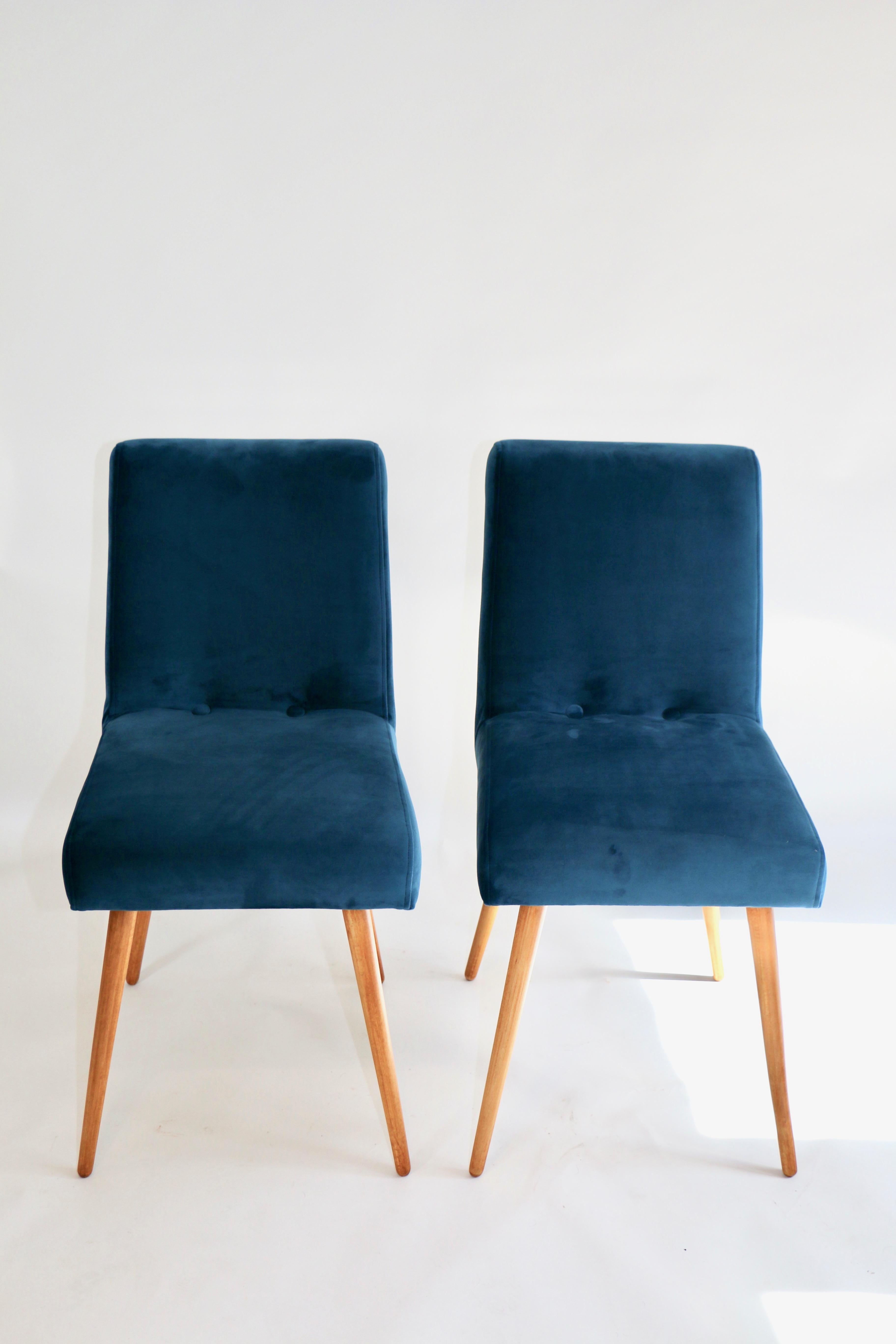 Set of two blue chairs from 1970s, new upholstery covered with velvet fabric in fashionable blue marine color. Wooden elements in natural beech color. Completely restored. Perfect condition.


Dimension: H 83 x W 41 x D 50.
