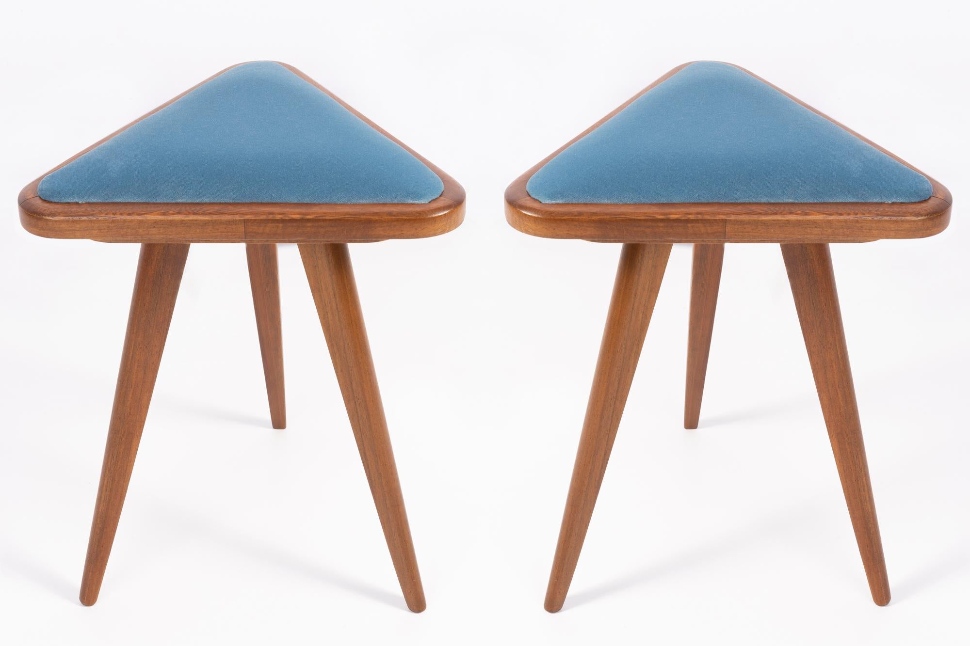 Stools from the turn of the 1960s and 1970s. Beautiful velour upholstery in blue color. The stools consists of an upholstered part, a seat and wooden legs narrowing downwards, characteristic of the 1960s style. They are absolutely unique.

Any
