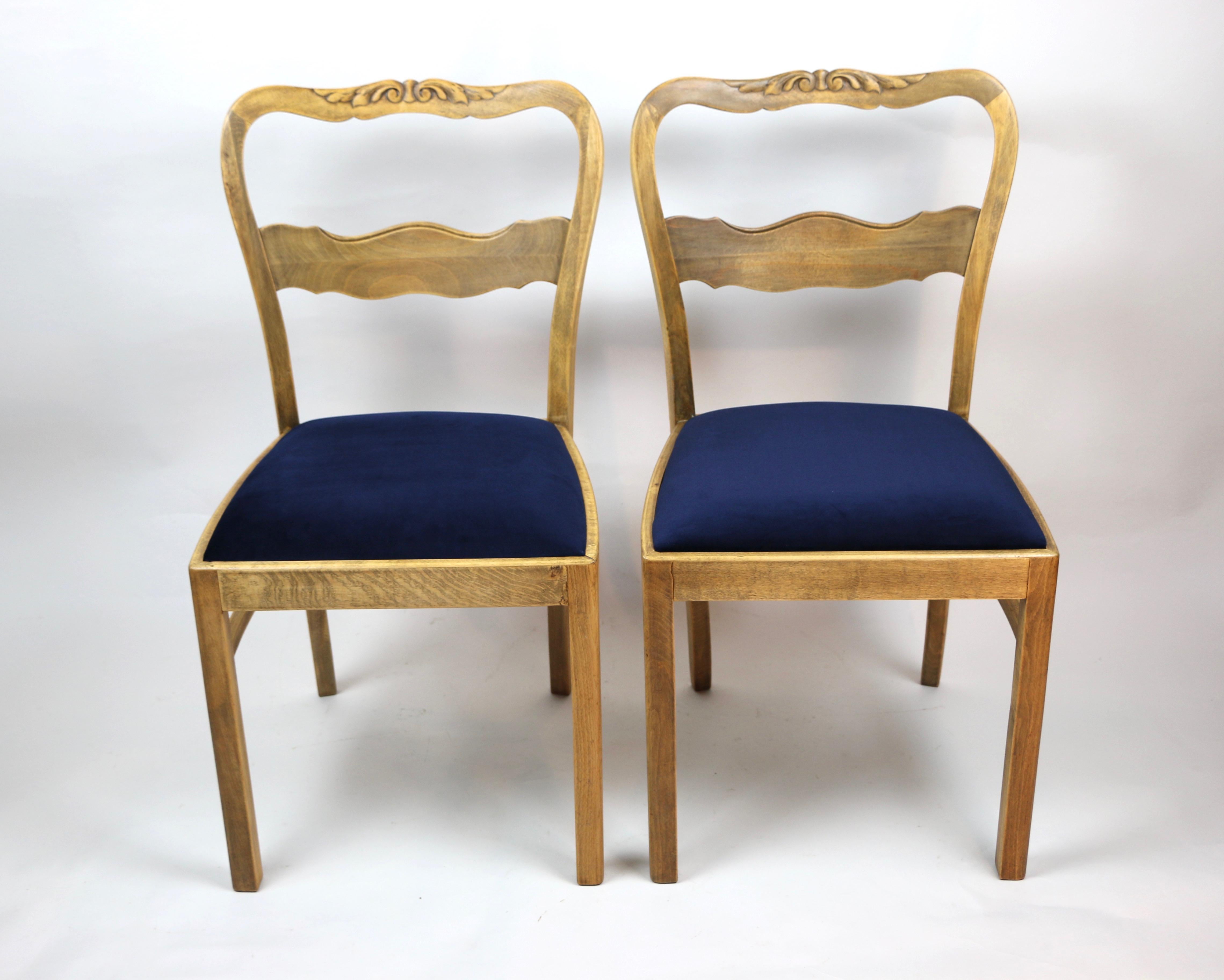 Set of two blue chairs from 1960s produced in Germany, new upholstery covered with velvet fabric in fashionable blue color. Wooden elements in natural oak color. Completely restored. Very solid construction and condition.

Dimension: H 87 x W 47 x