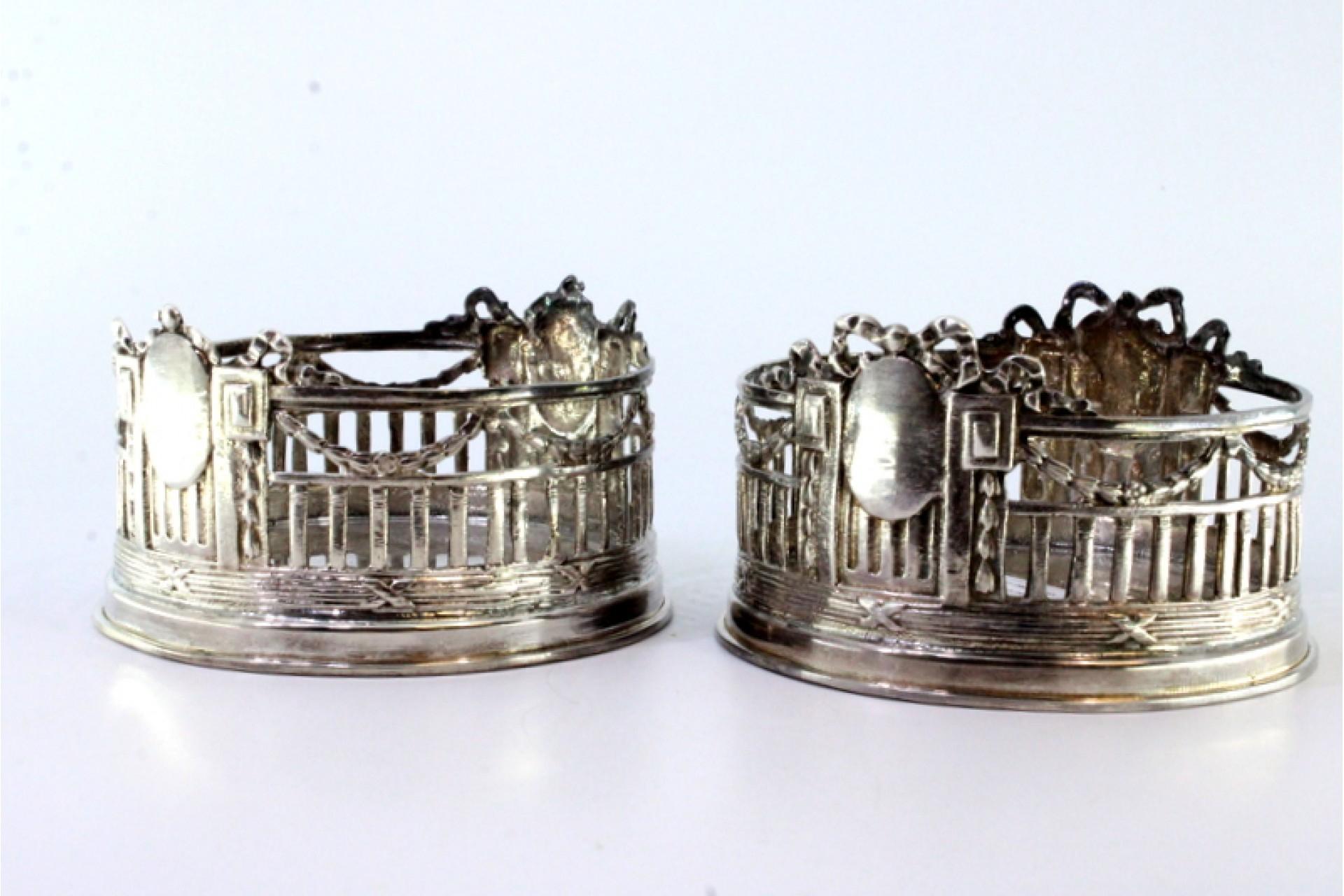 European Set of two bottle bottoms in cut silver w/ monogram cards & surrounding strips For Sale