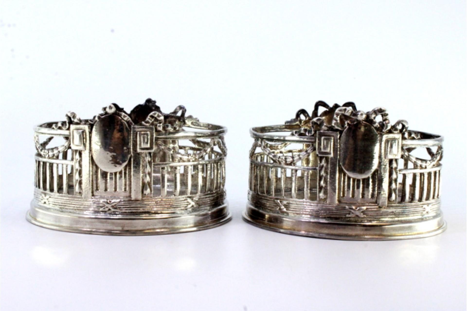 Set of two bottle bottoms in cut silver w/ monogram cards & surrounding strips For Sale 1