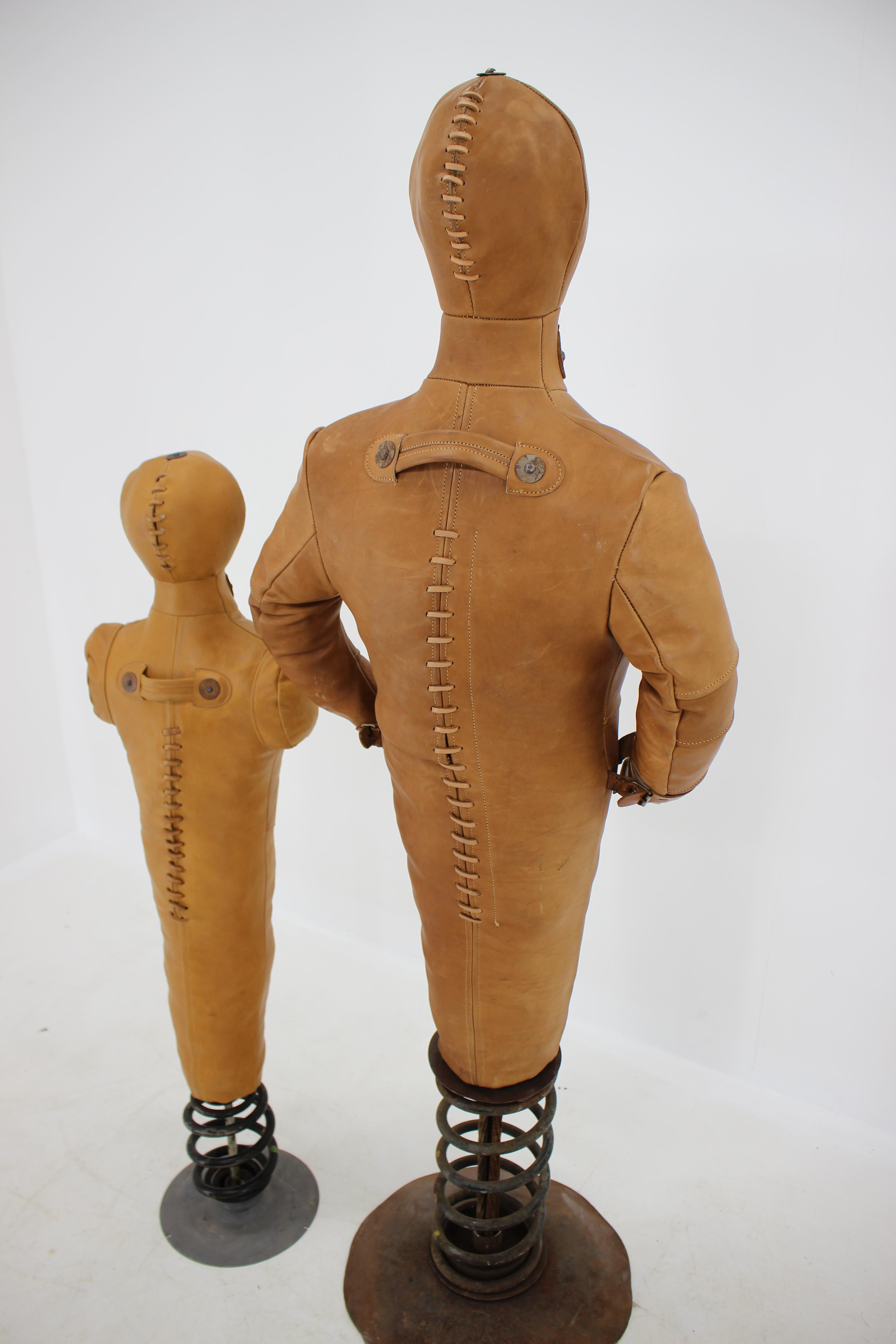 Set of two leather punching dummies on a heavy metal stands. Handmade in Czech Republic. Very good condition - no effects.
Height of the bigger one: 178cm
Height of the smaller one: 136cm.