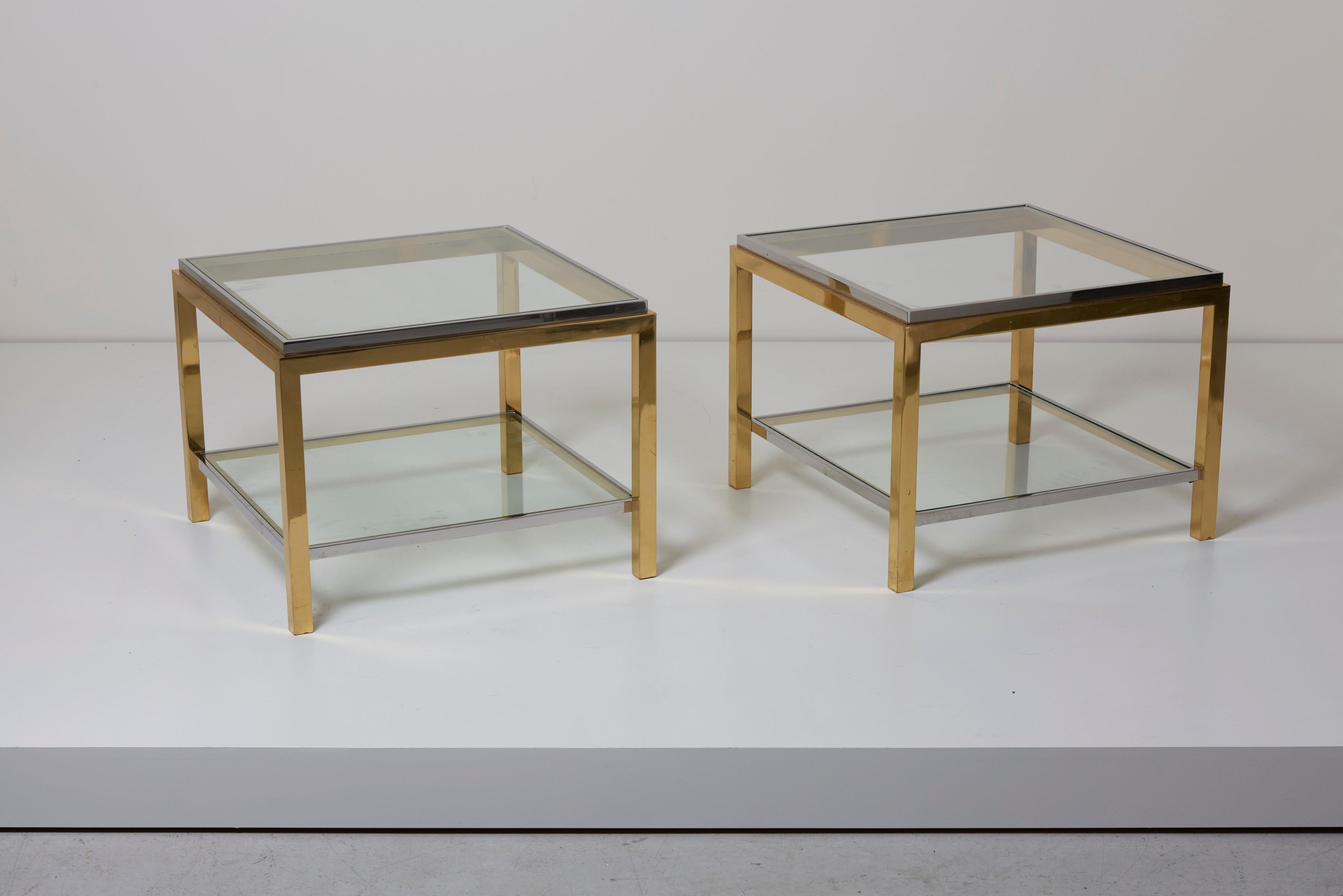 Wonderful pair of Maison Charles side or coffee tables in brass and chrome. The tables can also be used perfect also nightstands and they are in a good condition and hard to find as a pair.

