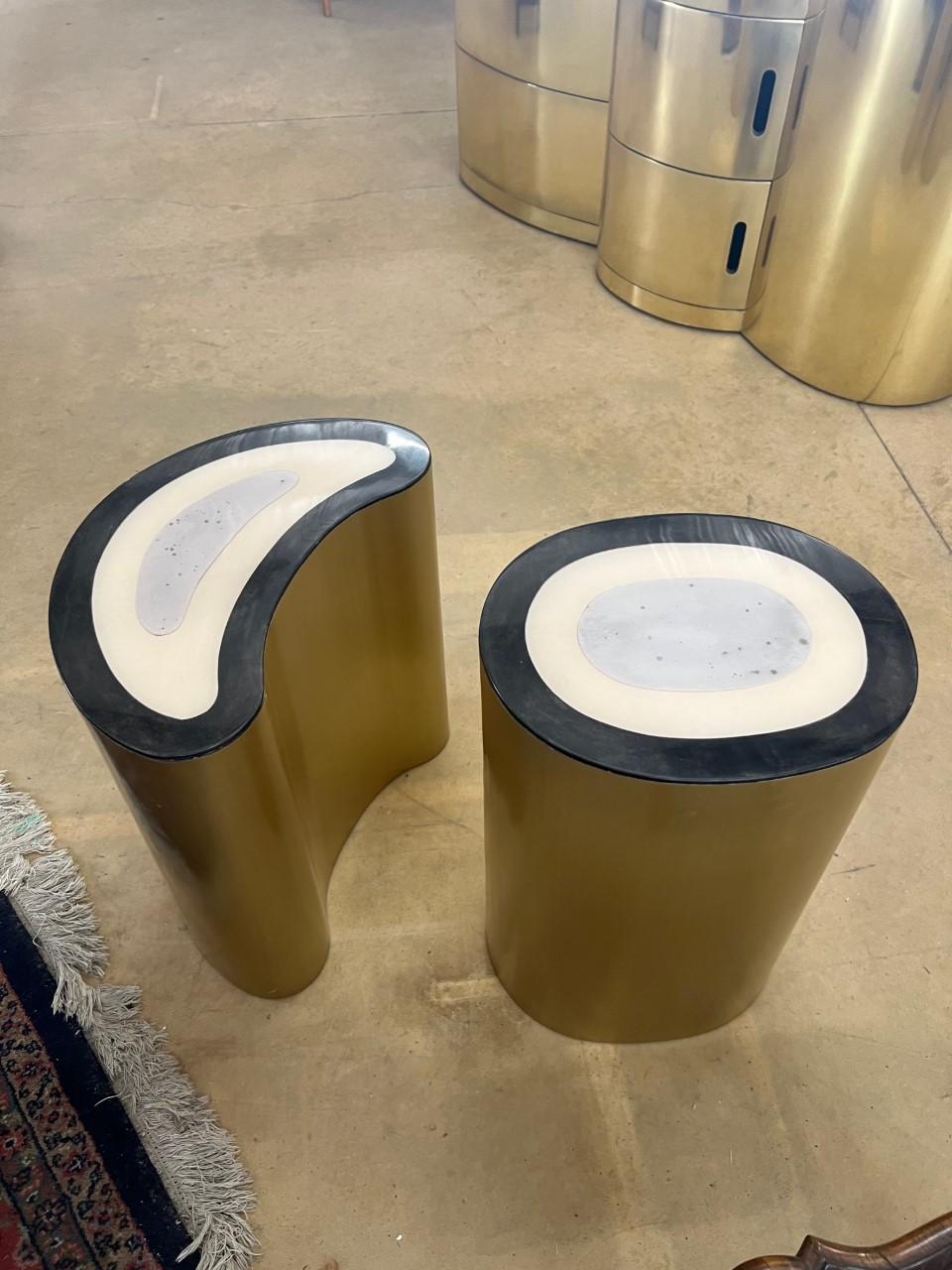 Set of two sculptural brass and parchment side tables with resin finish.

Color: 3 Tones: Brown, Natural, Tan Polished

Finish: Resin-Glazed, Crystal Coated


Dimensions of each side table :

#1 : W13.5? X D 11.5? X H 21?
#2 : W18.25? X D