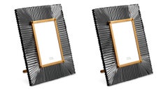 Juego de dos marcos de latón y cristal ahumado