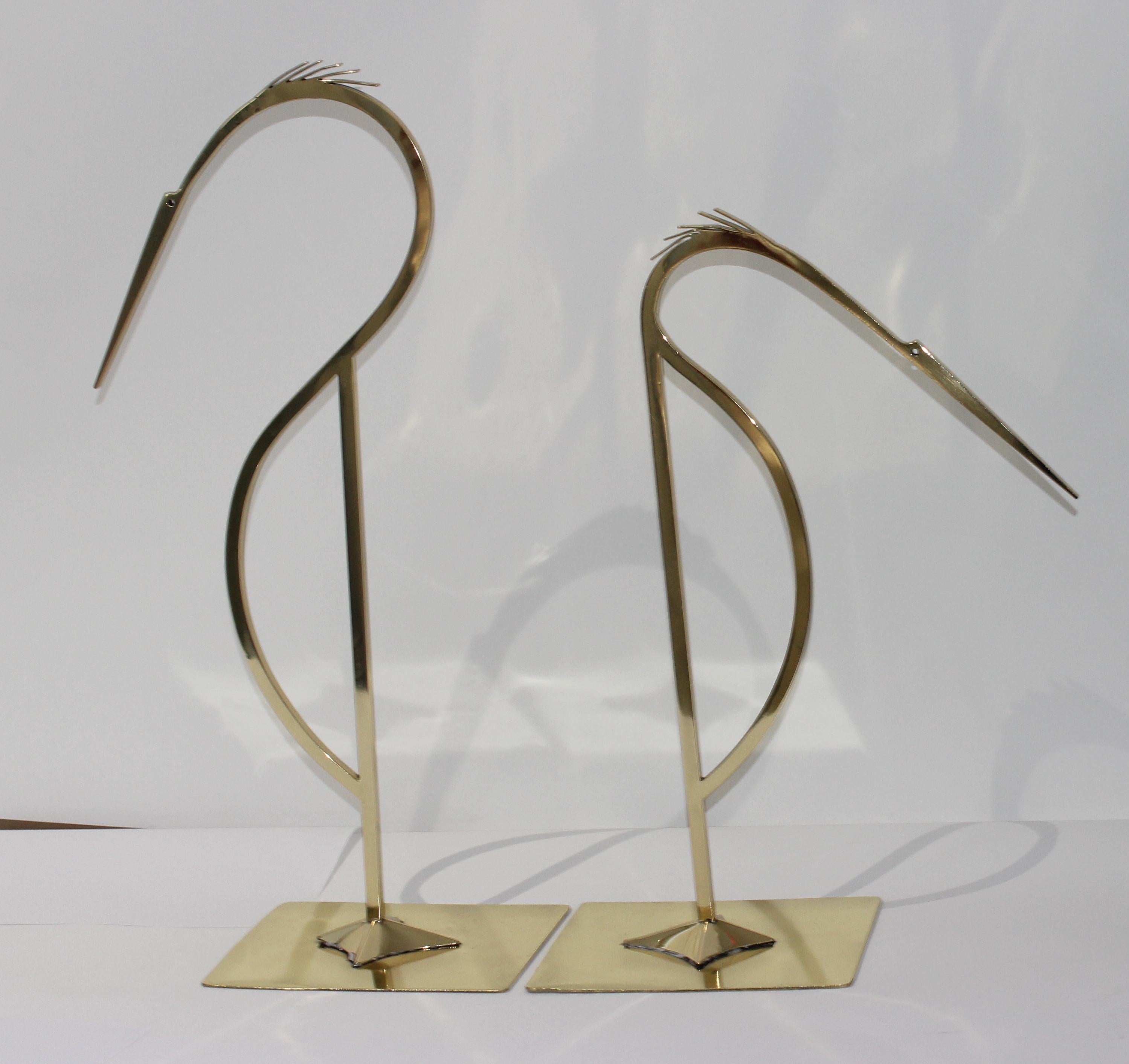 This stylish two piece set of stylized egrets date to the 1960s-1970s, and they will definetly make a subtle statement with their form and finish.

Note: Dimensions of the taller egret are 22.50
