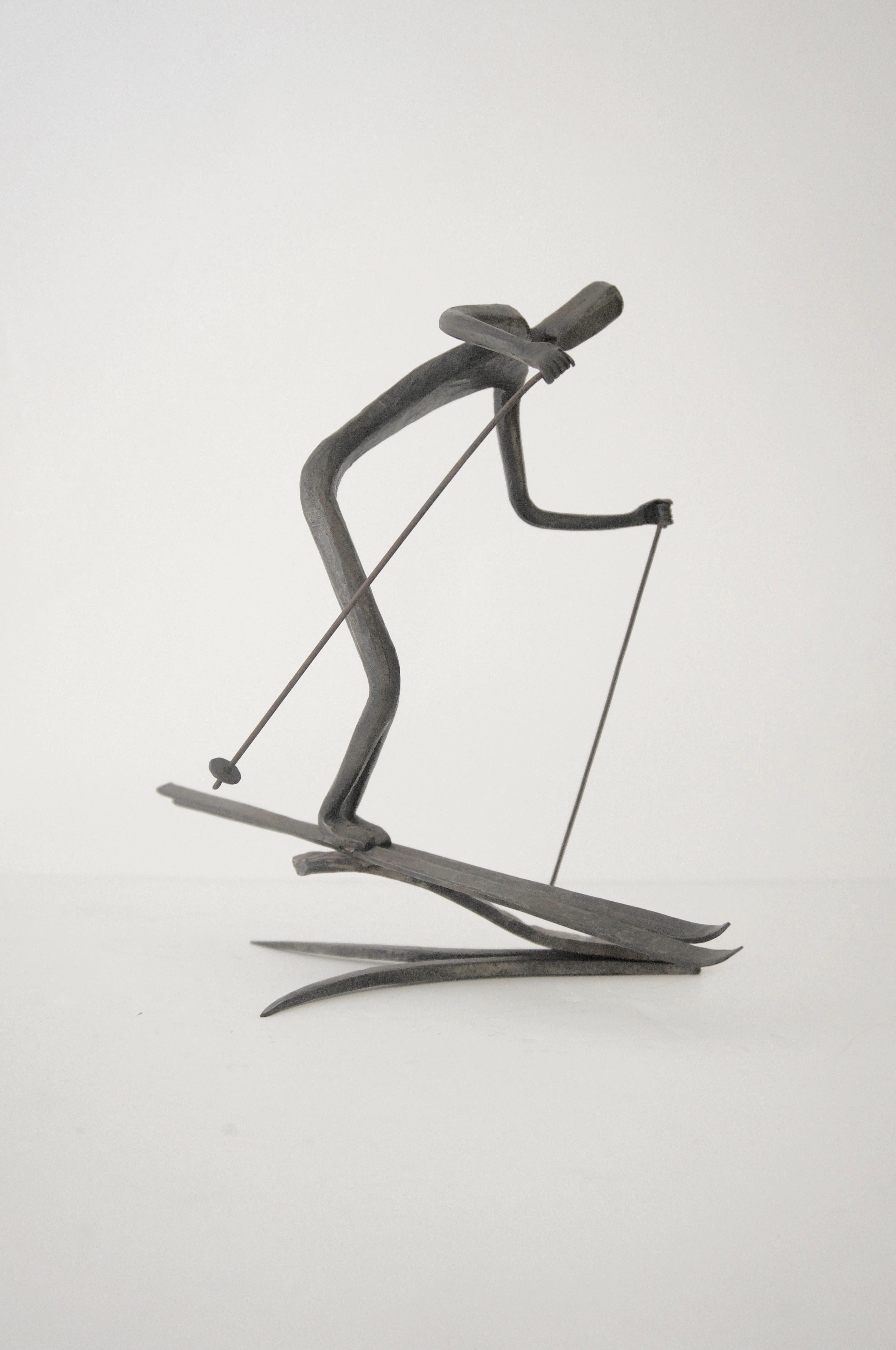 Américain Ensemble de deux sculptures en bronze représentant des figures de ski