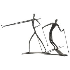 Set of Two Bronze Sculptures of Skiing Figures