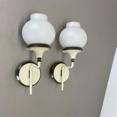 Set of Two Brutalist Brass and white glass Wall Light Sconces, France 1960s