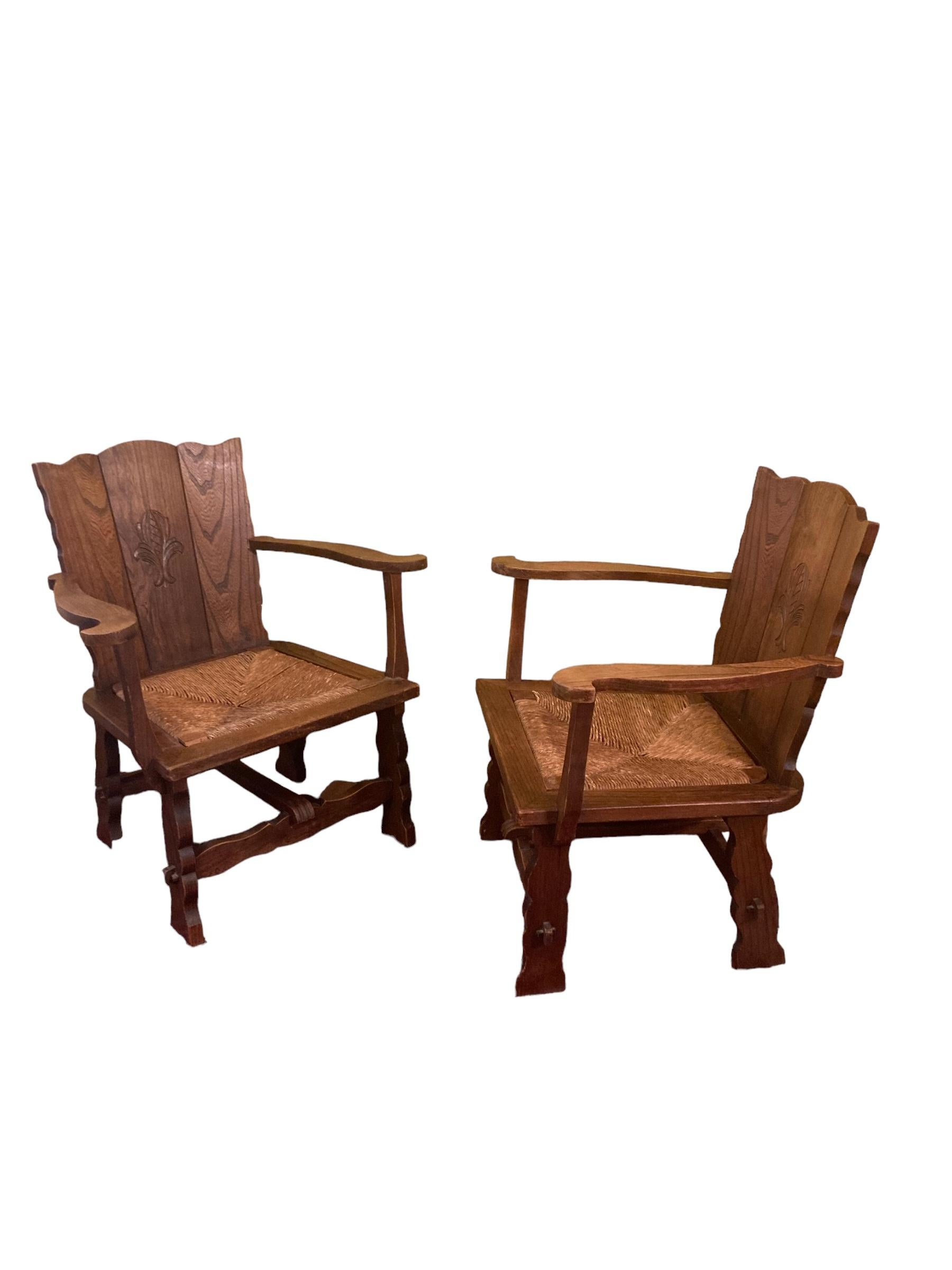 Set of Two Brutalist Wabi Sabi Oak Rush Lounge Chairs. Besigned with both comfort and style in mind. Crafted from Oak these chairs feature a sturdy frame, a comfortable seat, and a supportive backrest. Its timeless design seamlessly blends with any