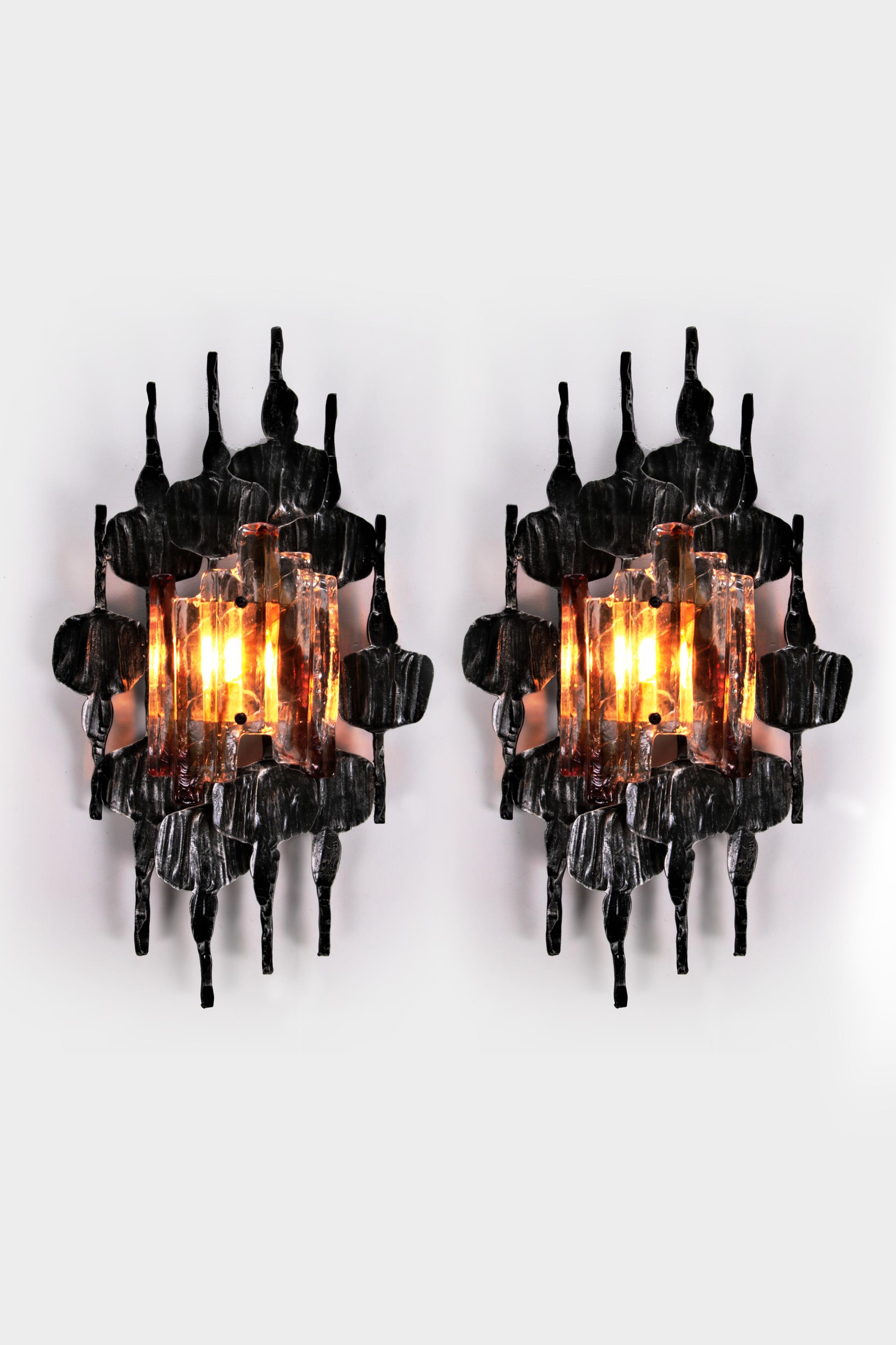 Set of two Brutalist wall lamp by Tom Ahlstrom & Hans Ehrlich, Sweden 1960s


Brutalist wall lamp by Tom Ahlstrom & Hans Ehrlich, Sweden 1960s

Beautifully designed wall lamp, a real design object.

Handmade wrought iron base and mouth blown murano