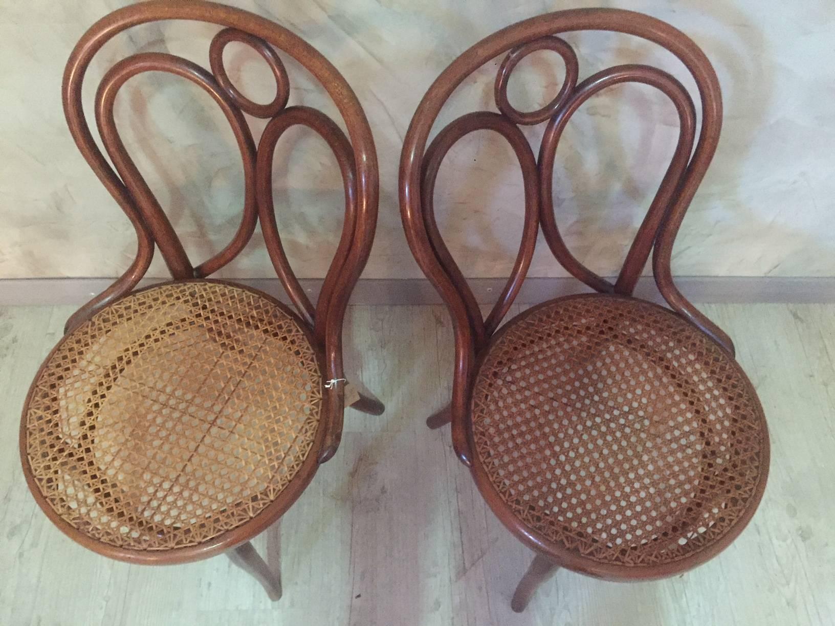 Set of two caned Thonet dining chairs from the 1900s.