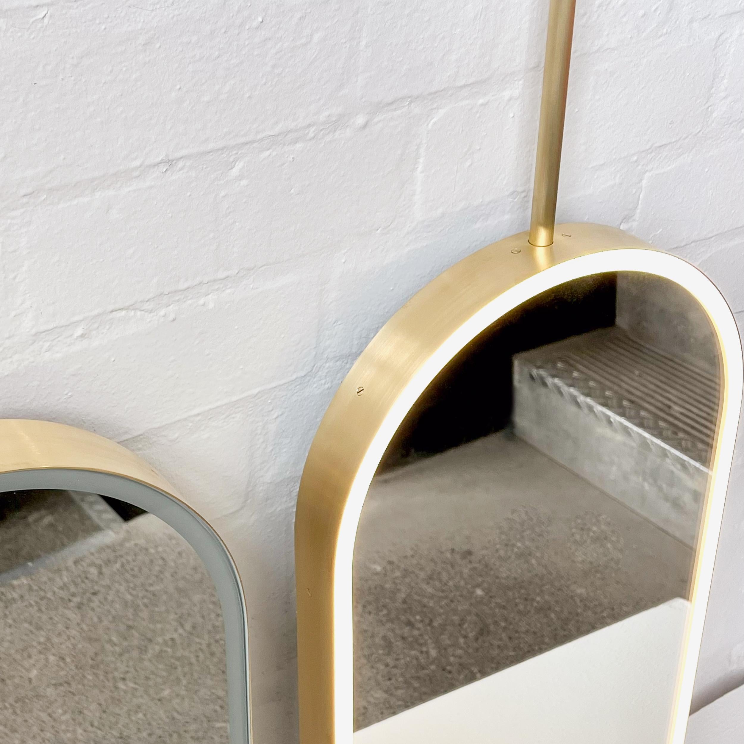 Contemporary Set of two Capsula Illuminated Modern Ceiling Suspended Mirror with Brass Frame For Sale