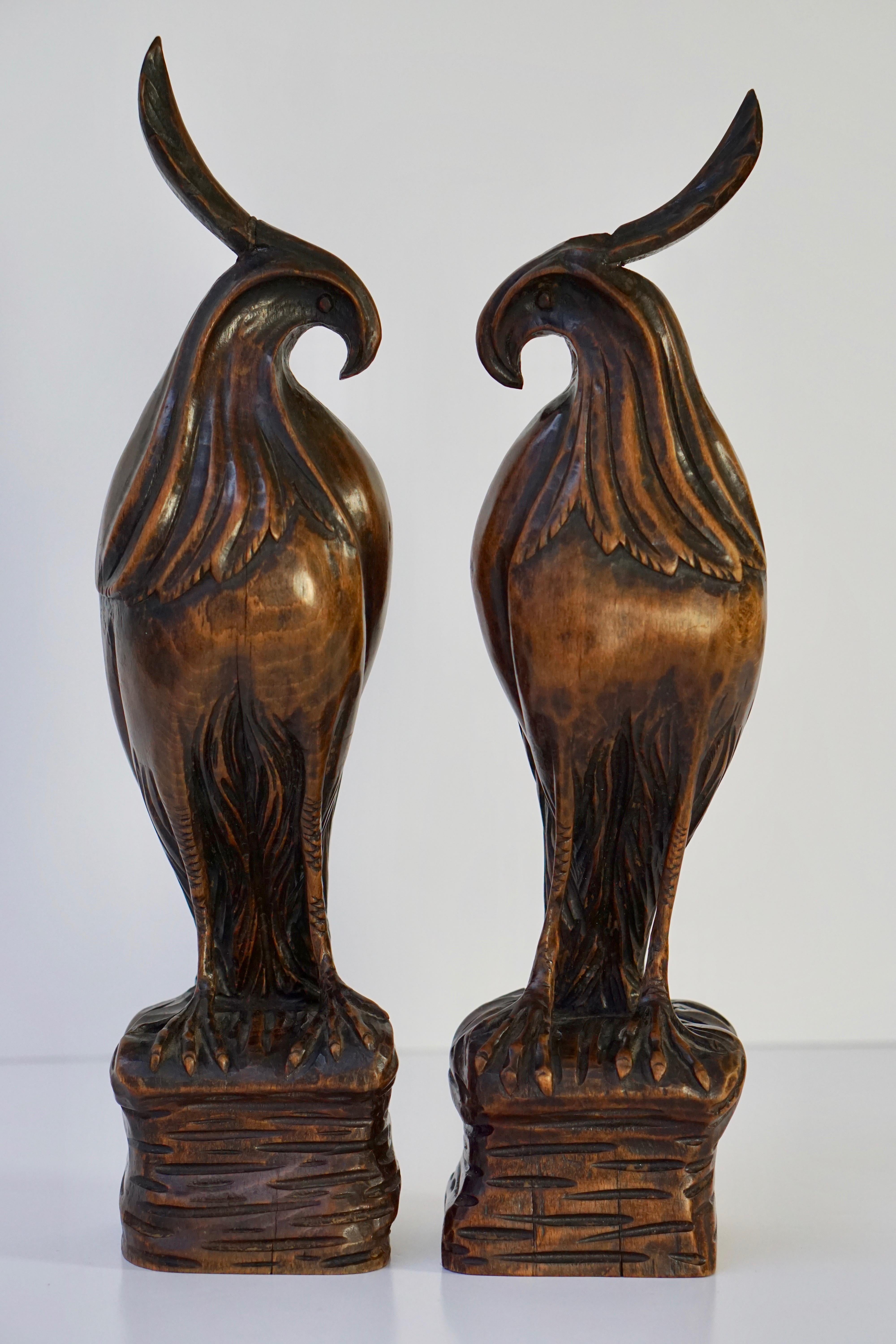 Two highly styled carved wooden birds.
Height 38 cm.