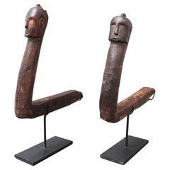 Set of Two Carved Wooden Tools with Human Faces from Nias, Indonesia