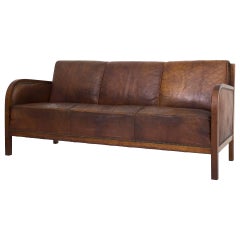 Set of Two Chairs and a Three-Seat, Patinated Niger Leather and Cuban Mahogany