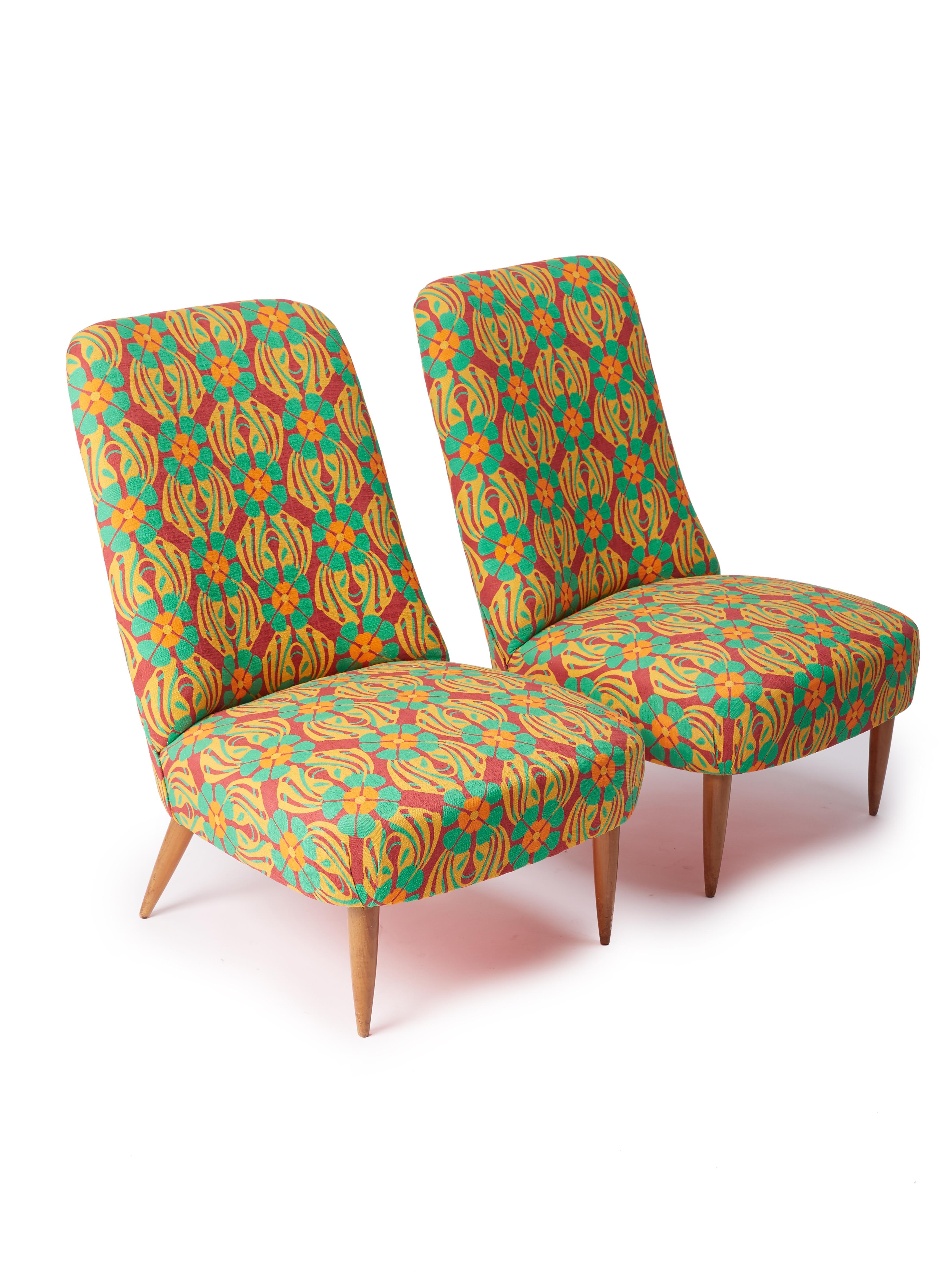 Settle into some la dolce vita history with this set of two vintage chairs originally made in Italy in the 1950s - part of our happy-making homeware collaboration with the antique marketplace maestros, 1stDibs. High-backed and crafted from