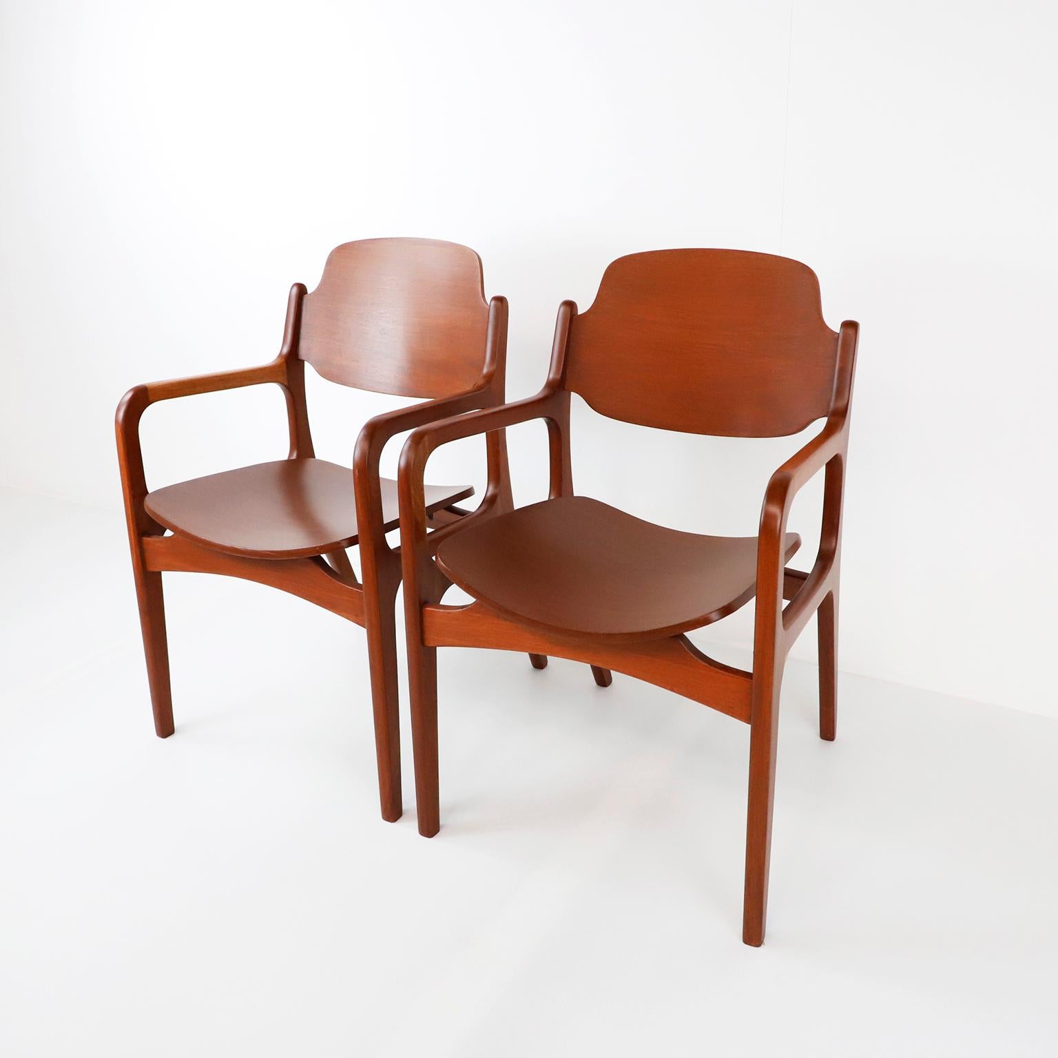 Circa 1960, we offer this set of two early chairs by Michael Van Beuren made in mahogany and plywood, includes brand label.

About Michael Van Beuren:

Michael Van Beuren (1911–2004) was born in New York and studied architecture at the Bauhaus