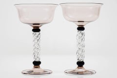 Set of two champagne goblets in amethyst, twisted stem and black necks, Cenedese