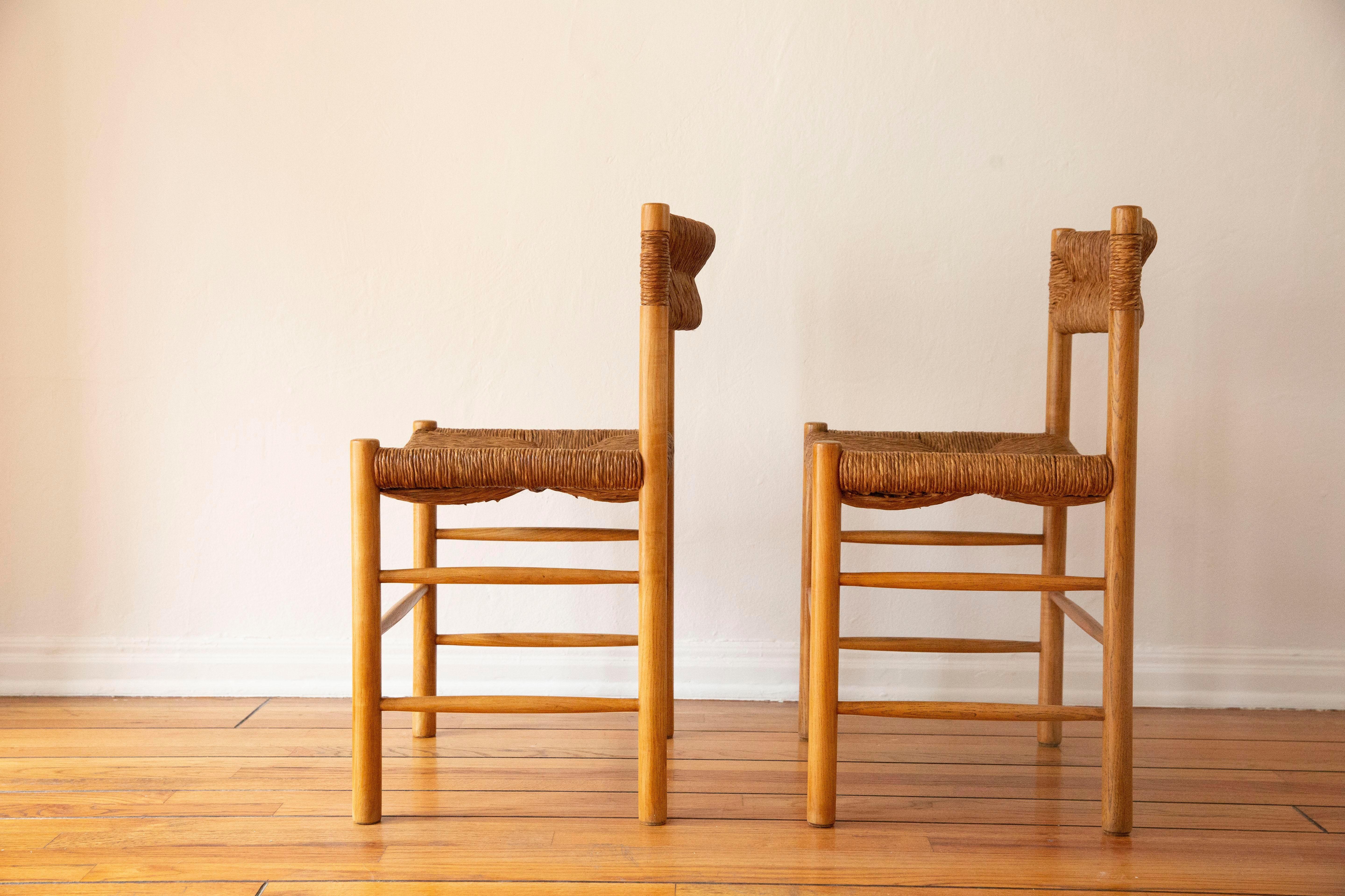 French Set of Two Charlotte Perriand 'Dordogne' Rush Dining Chairs, 1950's For Sale