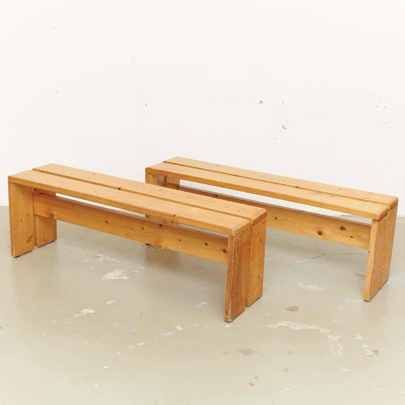Benches designed by Charlotte Perriand for Les Arcs ski resort circa 1960, manufactured in France.
Pinewood.

In original condition, with wear consistent with age and use, preserving a beautiful patina.

Charlotte Perriand (1903-1999). She was