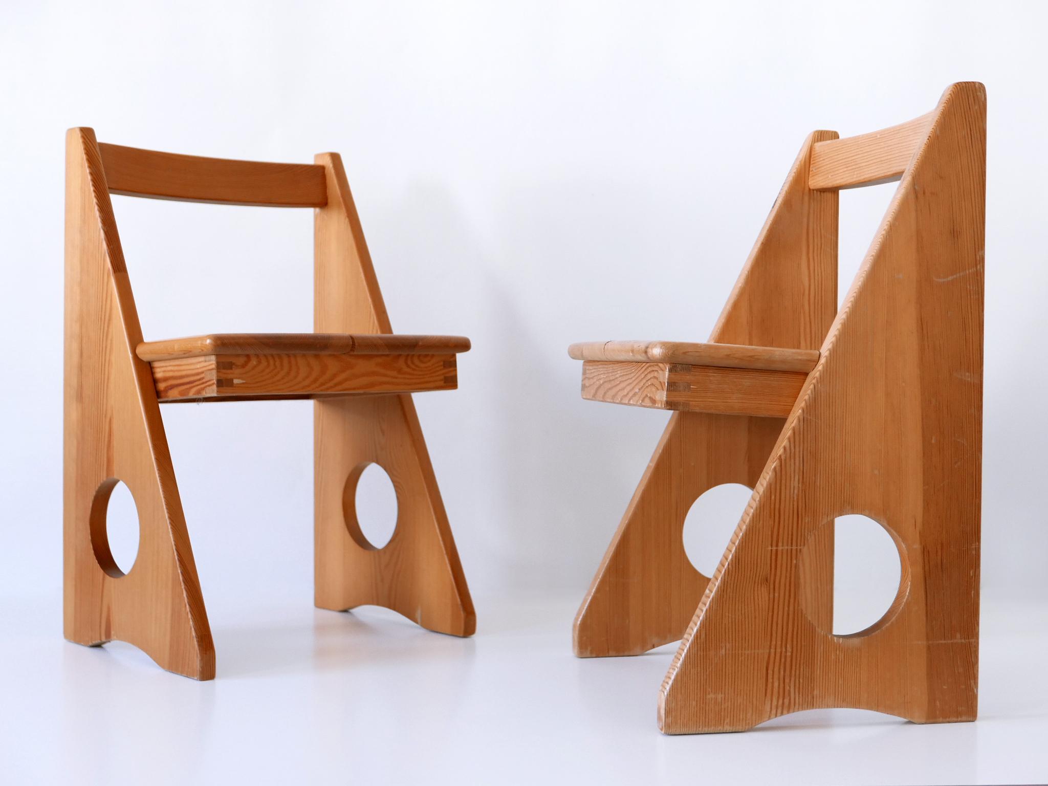 Set of two extremely rare and highly decorative Mid-Century Modern children's chairs by Gilbert Marklund for Furusnickaren AB, Sweden, 1970s.

Executed in massive pine wood.

Overall measurements:
H 20.87 in. (53 cm)
W 13.39 in. (34 cm)
D