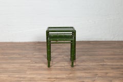Set of Two Chinese Bamboo Green Lacquered Nesting Tables with Side Stretchers