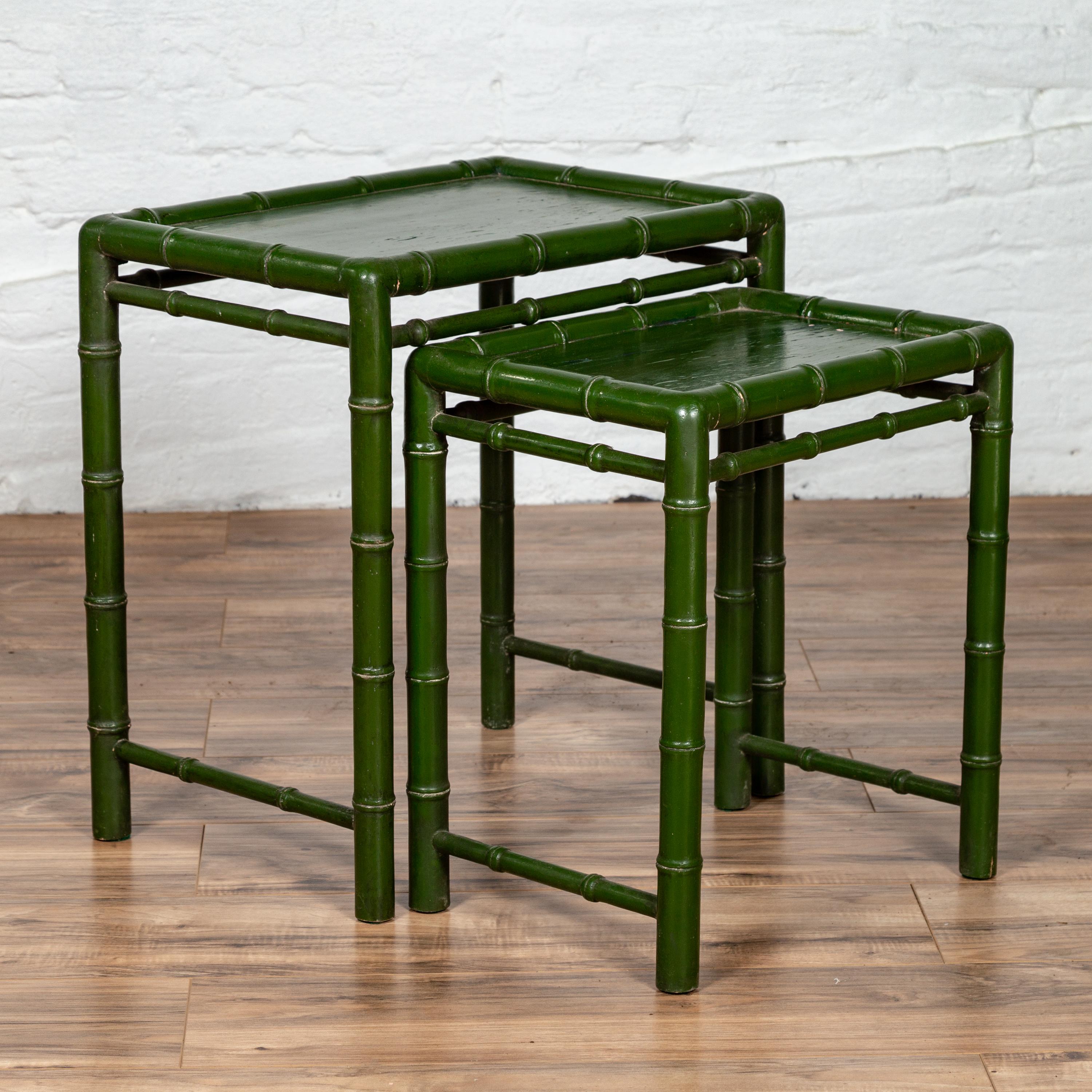 Set of Two Chinese Bamboo Green Lacquered Nesting Tables with Side Stretchers 1