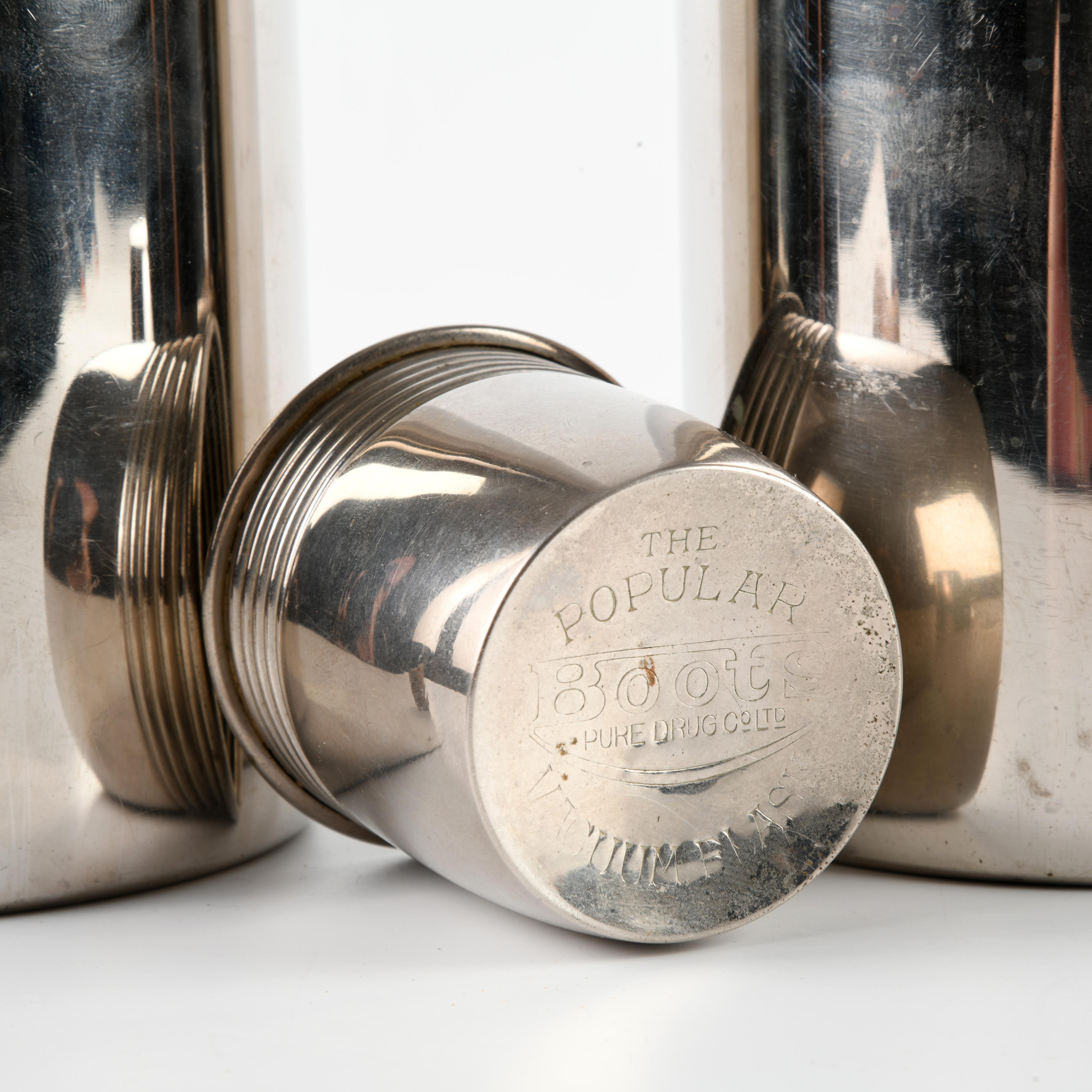 Set of two chrome-plated steel Thermos flasks, in a velvet-lined leather case 1